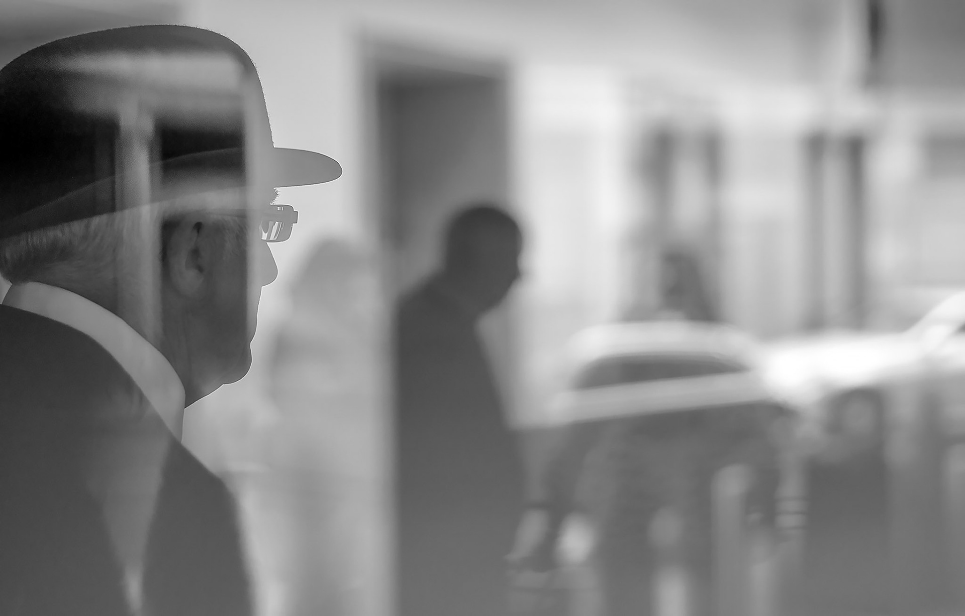 Doorman at the Conrad Hotel St. James Park keeps an eye on his domain.