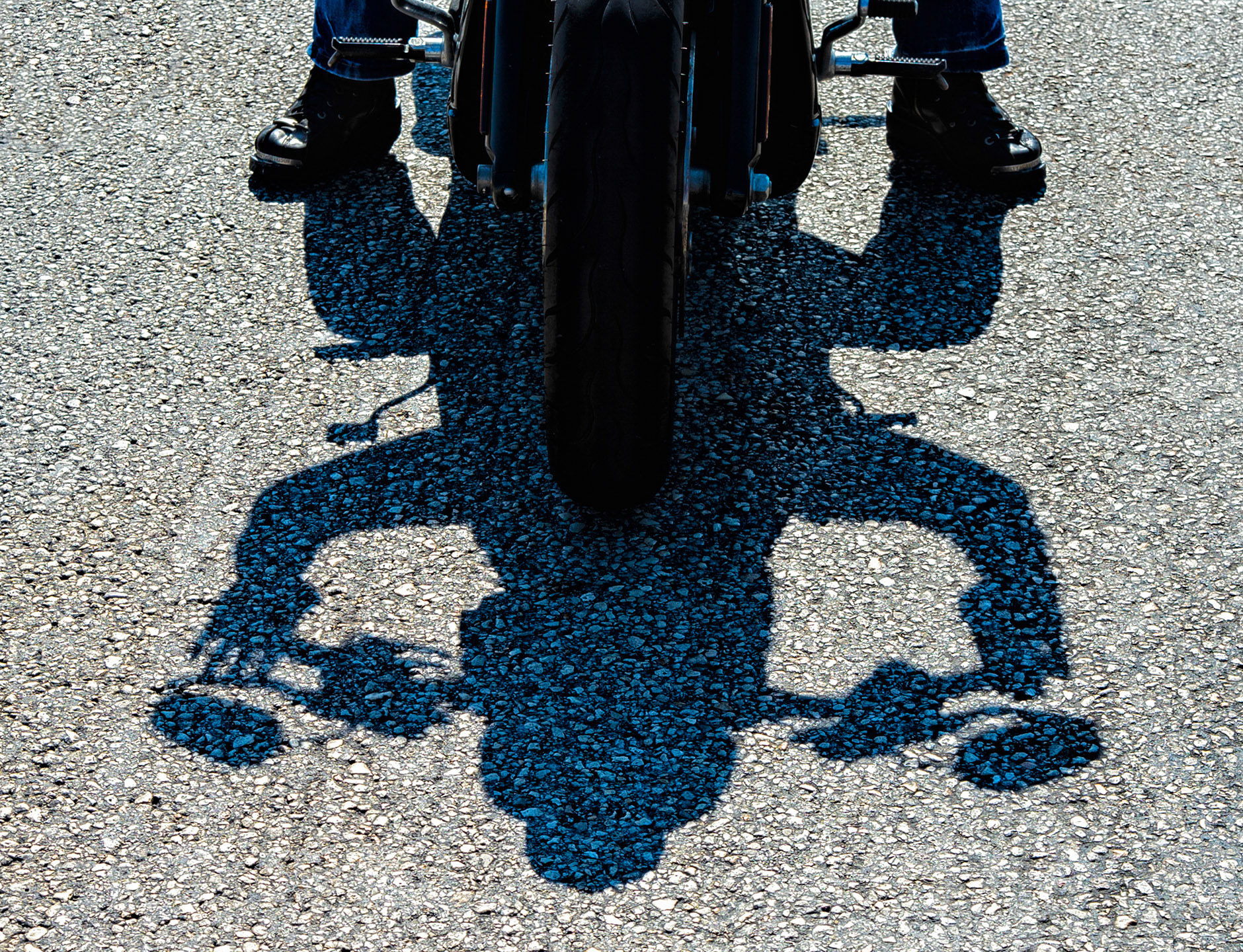 Motorcyclist stopped on road