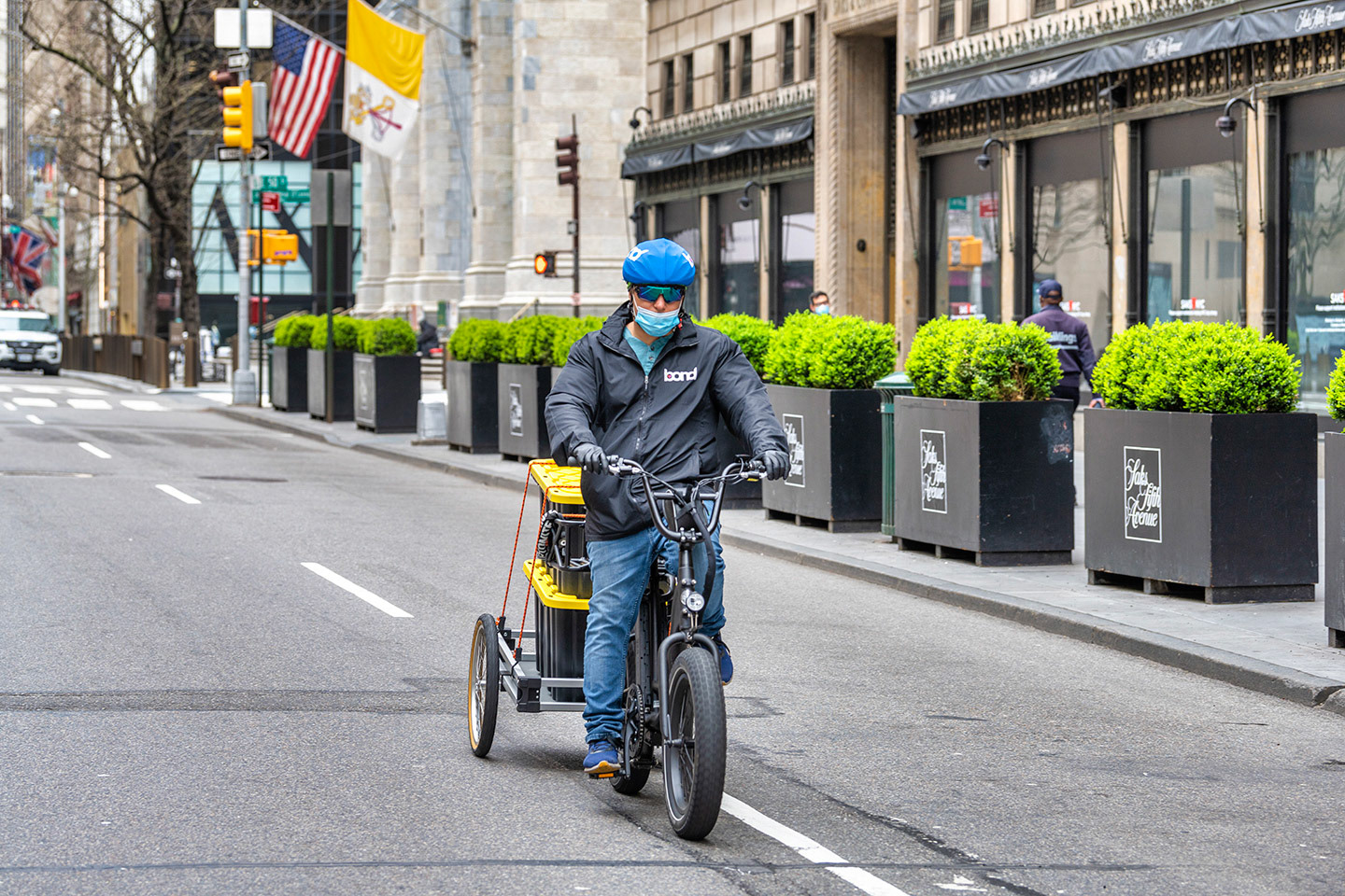 Bike delivery man on an empty 5th Ave during COVID19 lock down in NYC
