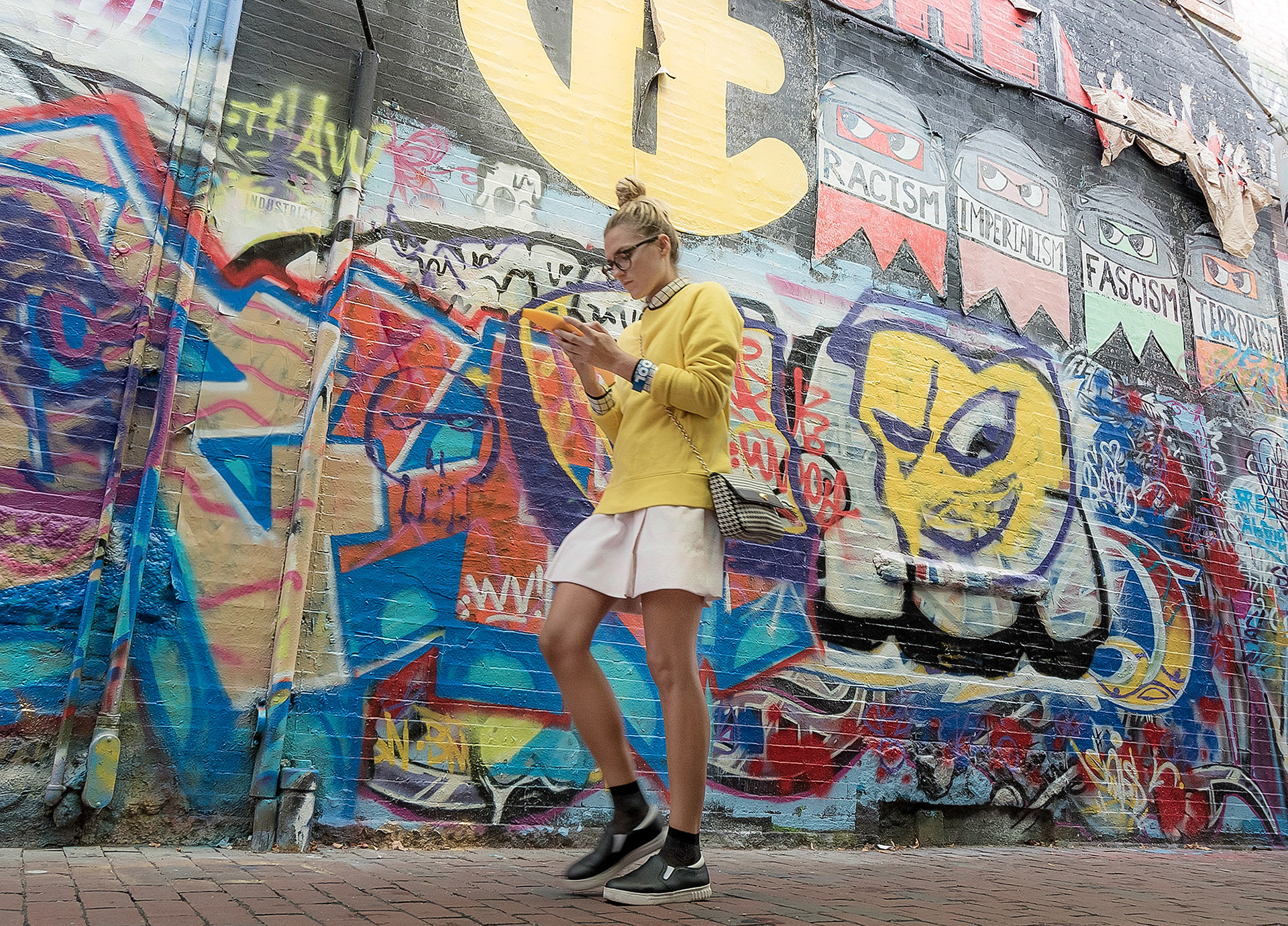 Walking by reality texting on a cell phone