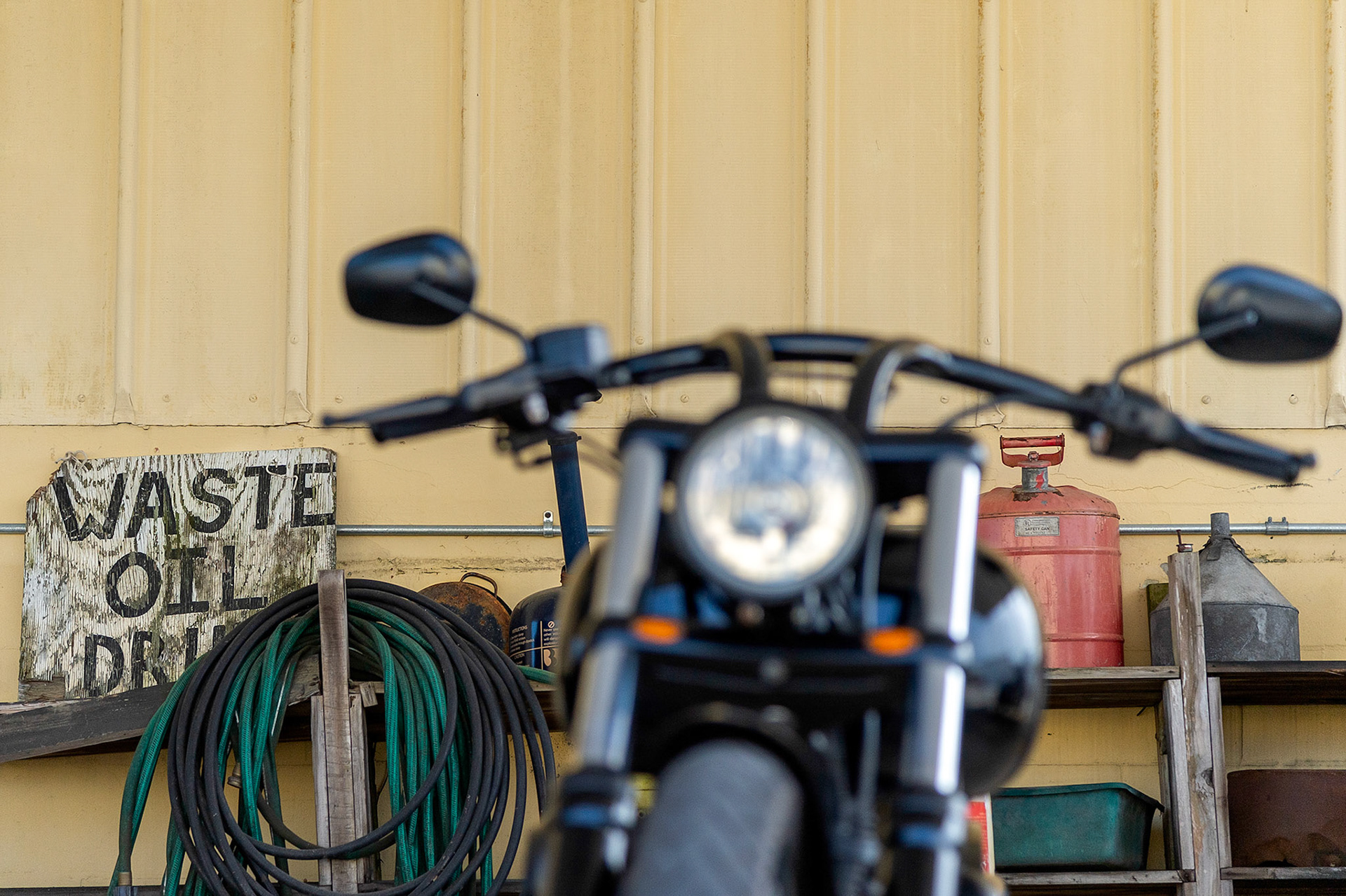 Waste oil sign and an old Harley, enough said.