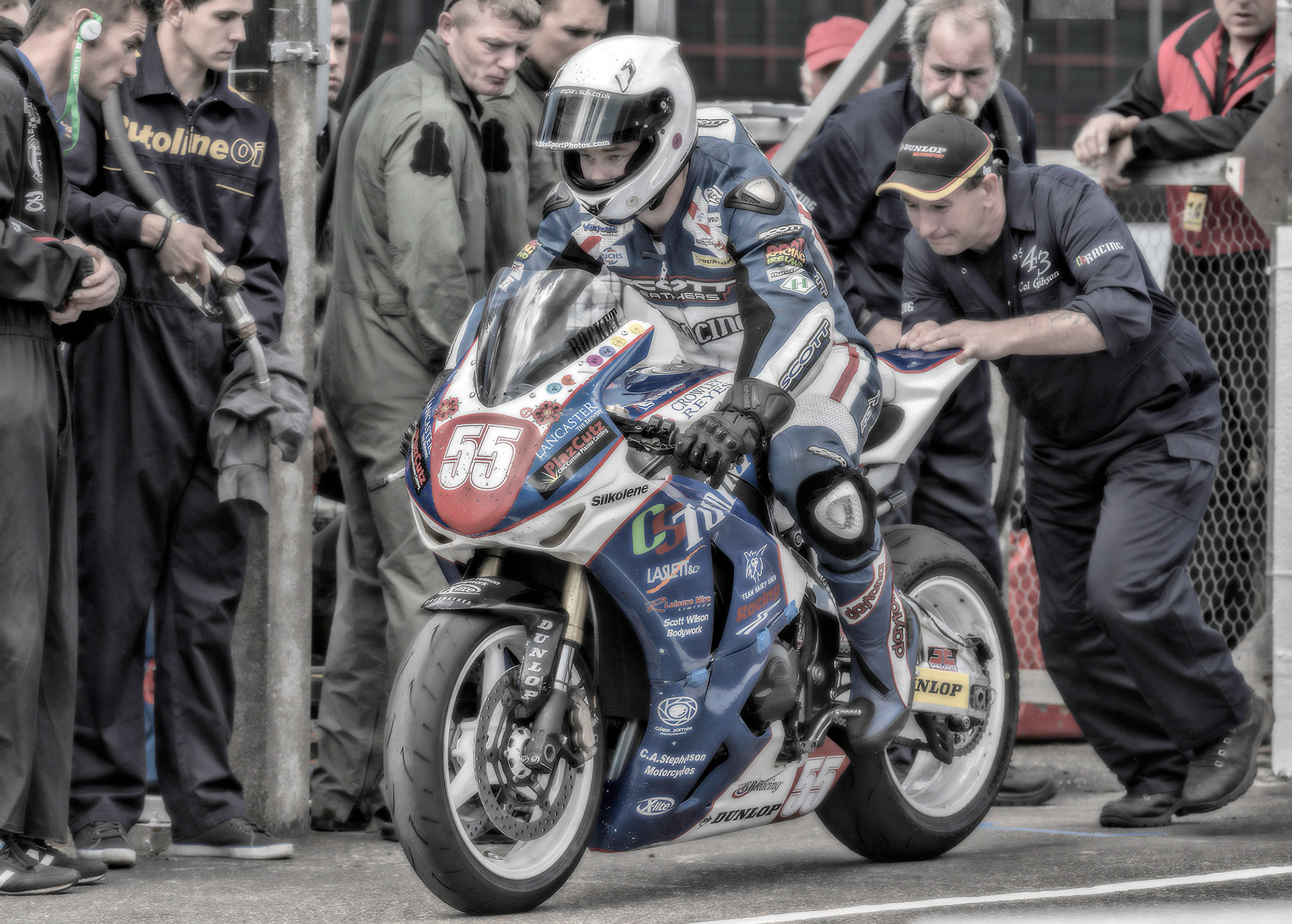 Colin Stephenson gets pushed from his pits during the Isle of Man TT