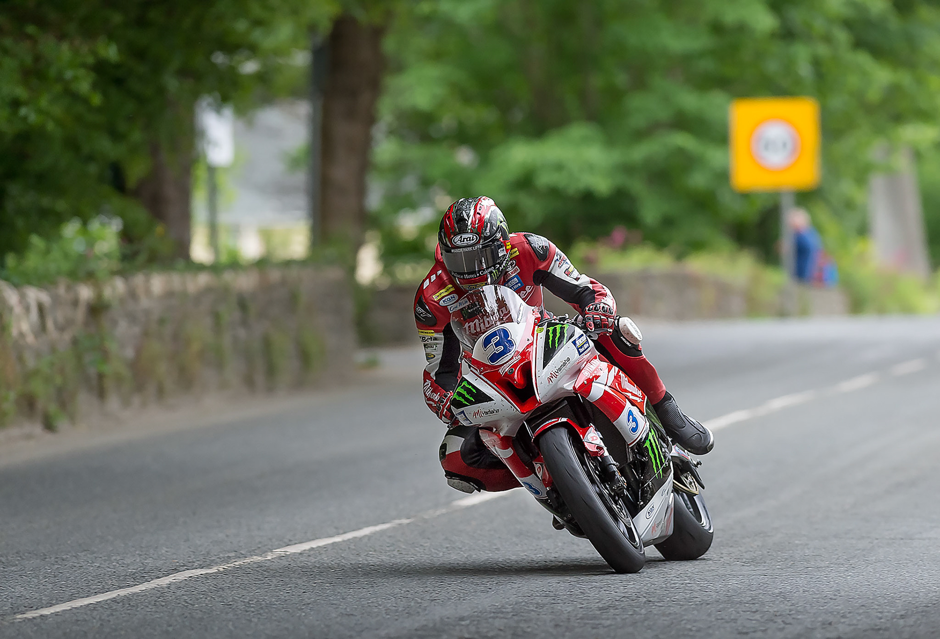 Ian Hutchinson thru Millntown during the 2014 Isle of Man TT Monster Energy SuperSport race 1