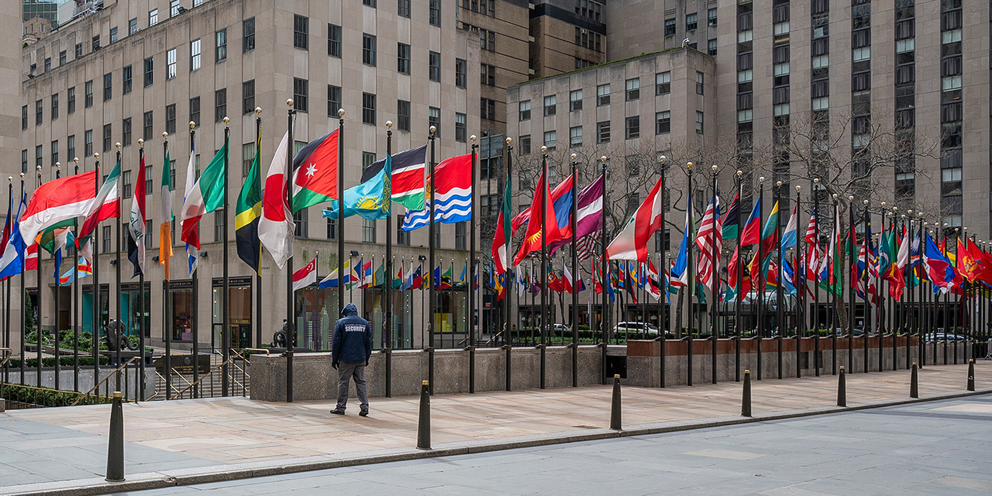 Security guard at Rockefeller Center Ice Rink stands alone during COVID-19 stay home directive.