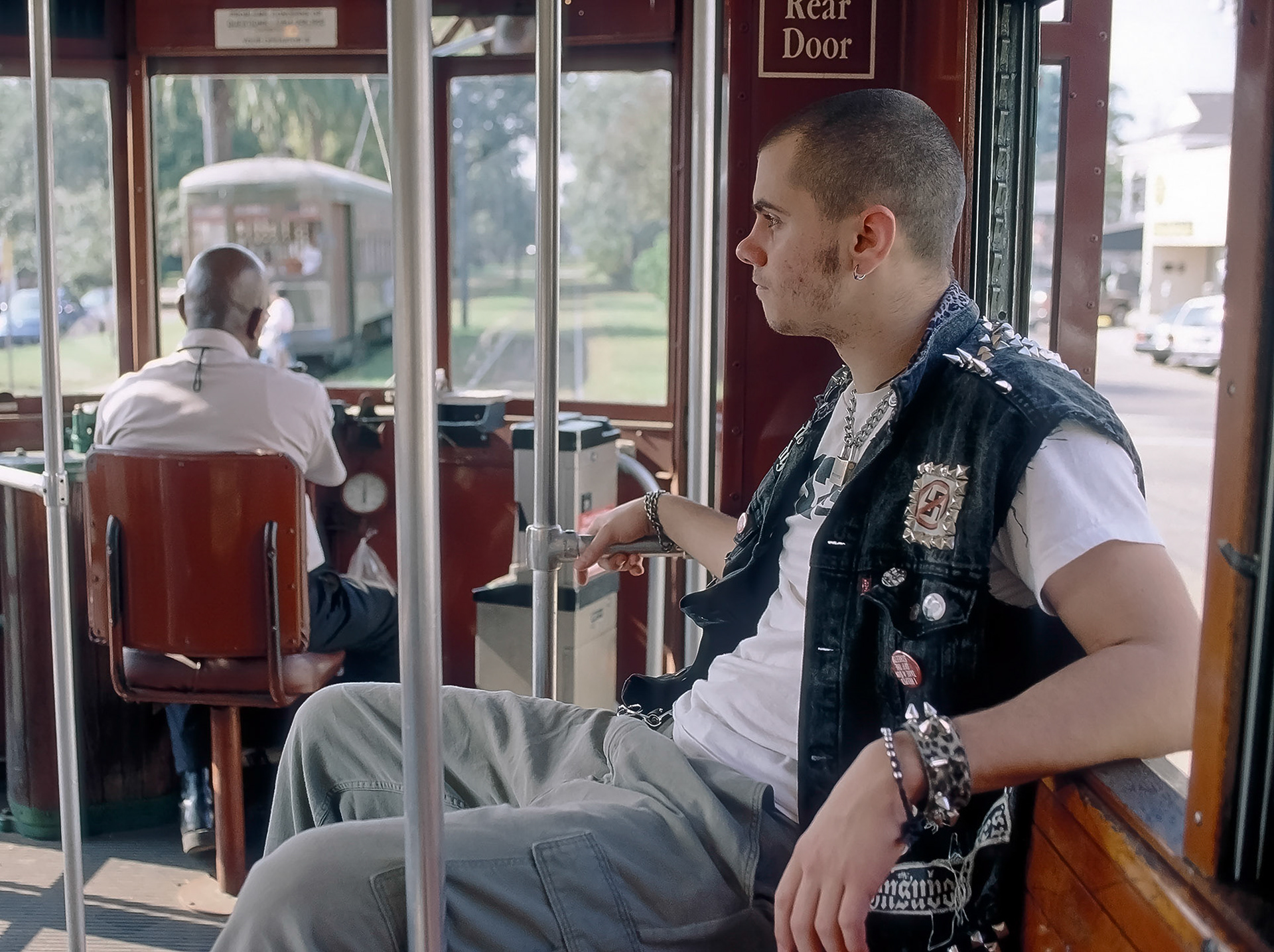 Shaved head, chains and a No Nazi patch, contradictions.