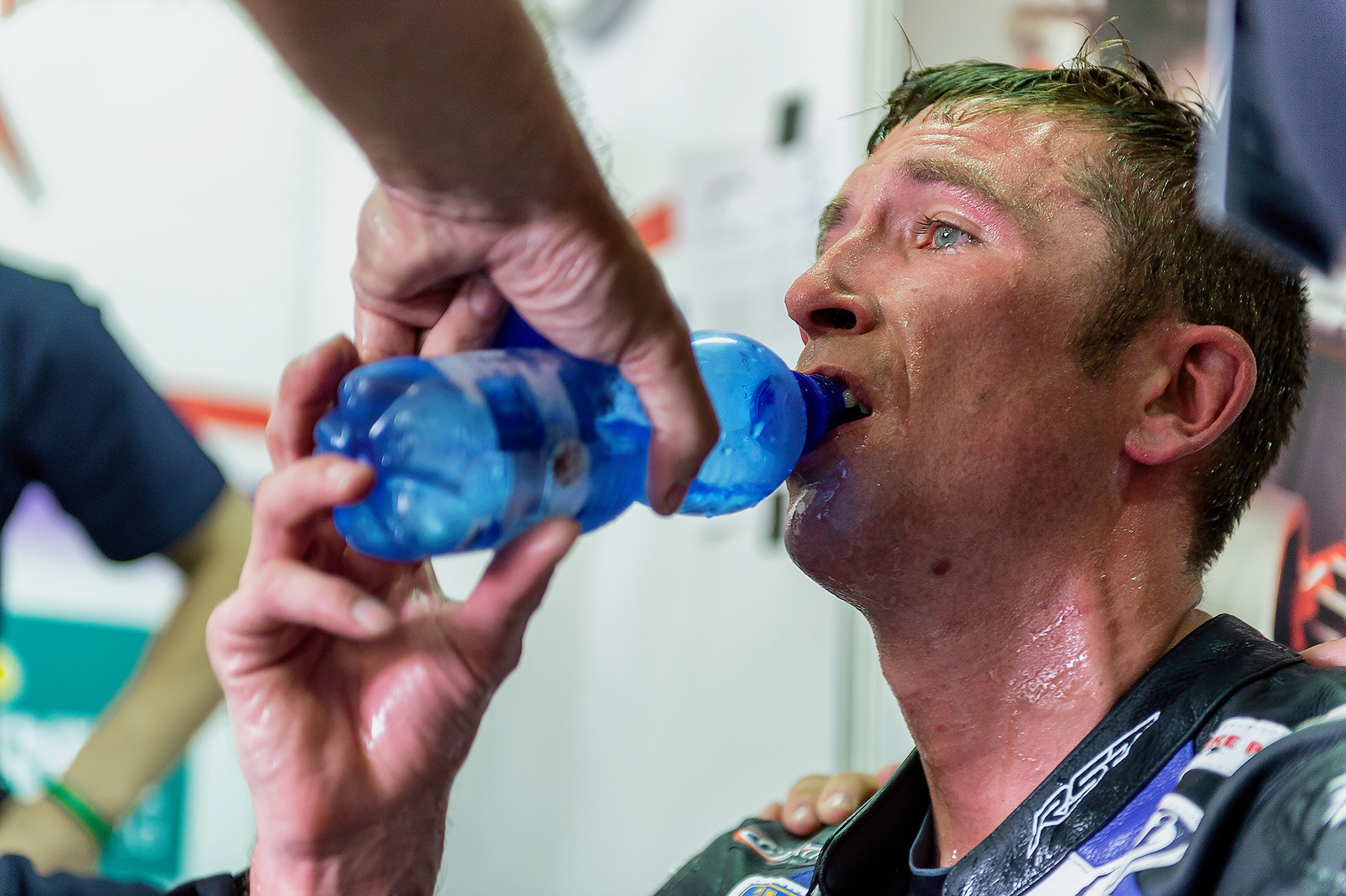 Totally exhausted Steve Mercer gets aid in his pit