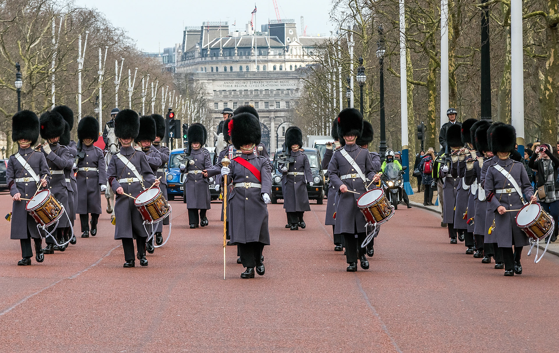 Queens band walking the Mall in London