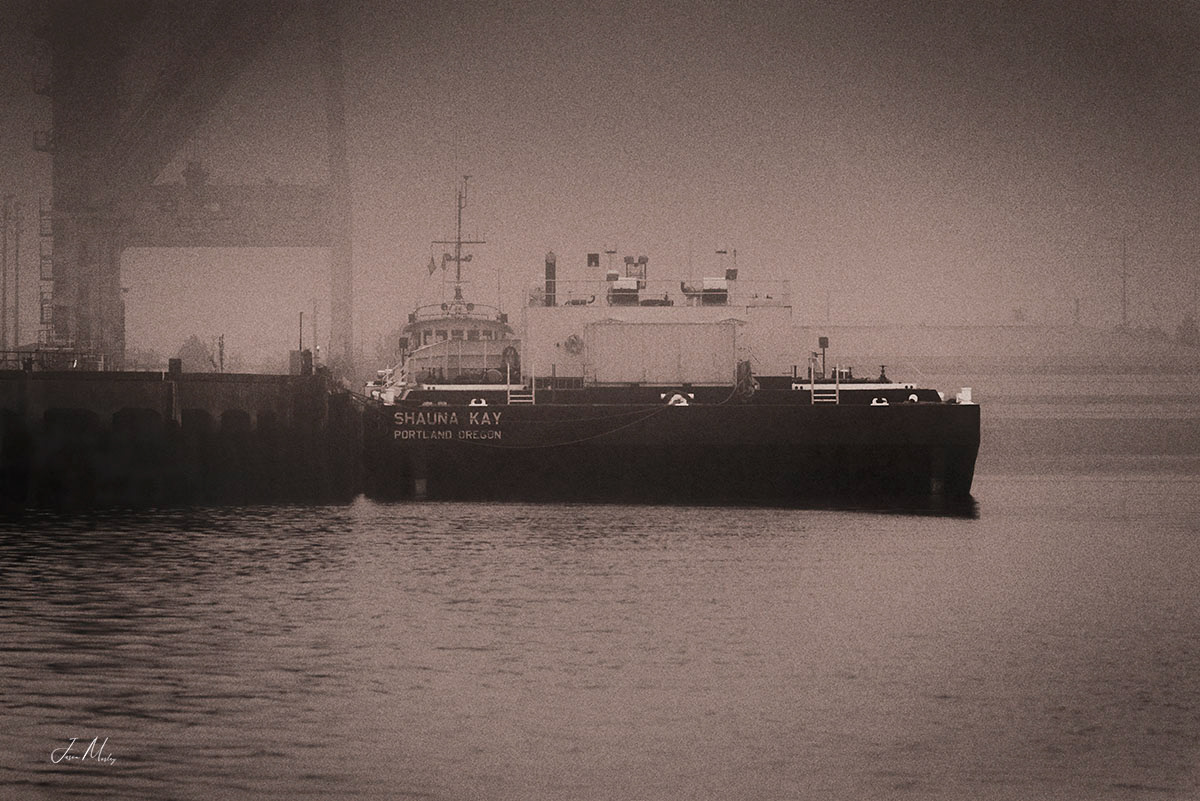 Old Tugboat on a foggy day in the Port of Tacoma
