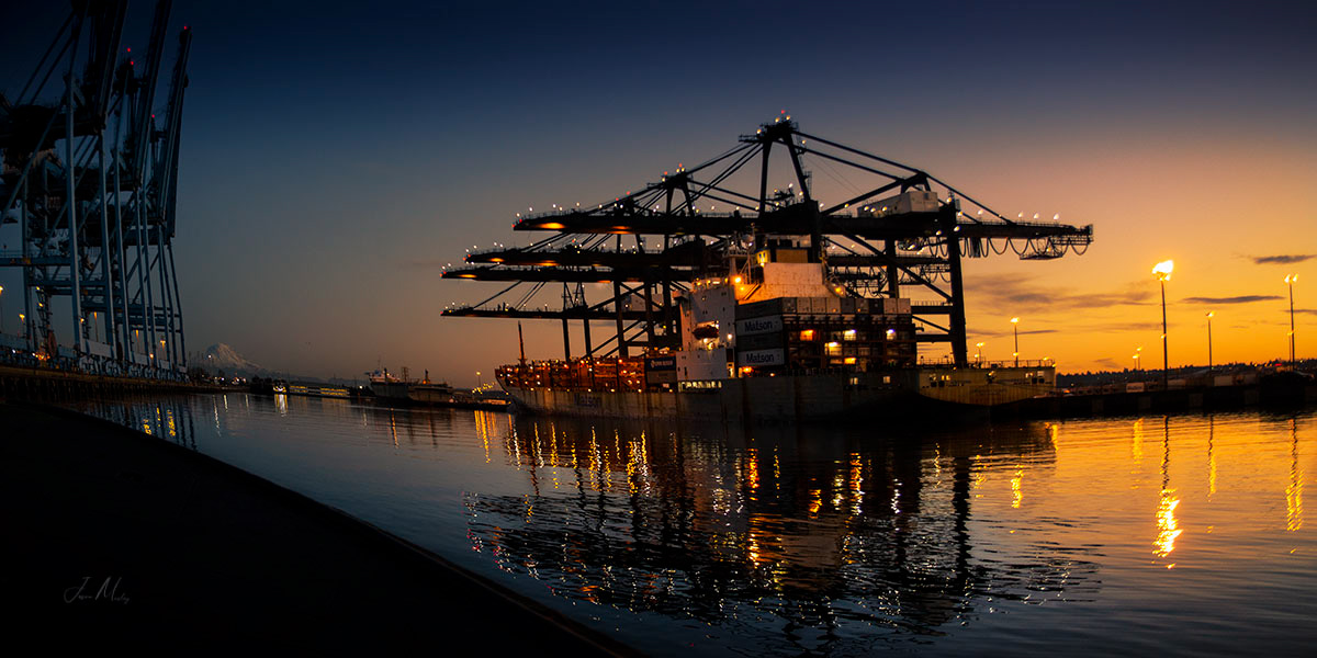 Sunset in the Port of Tacoma with a ship at dock