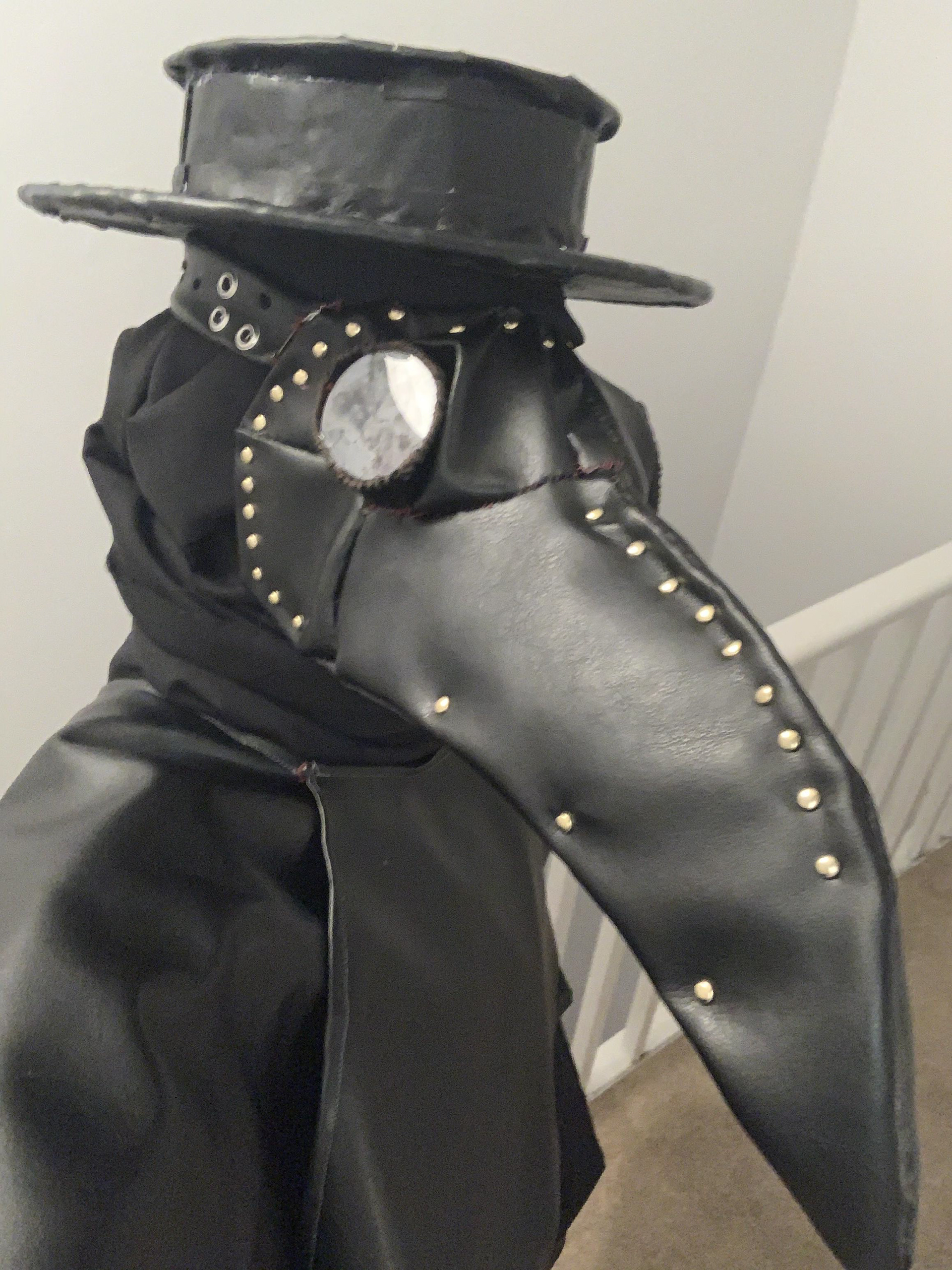 I used hot glue to add the lenses into the eye sockets. Because there was not much ventilation in the mask, I needed to put a light layer of soap on the inside of the lenses to keep them from fogging up from my breath.
