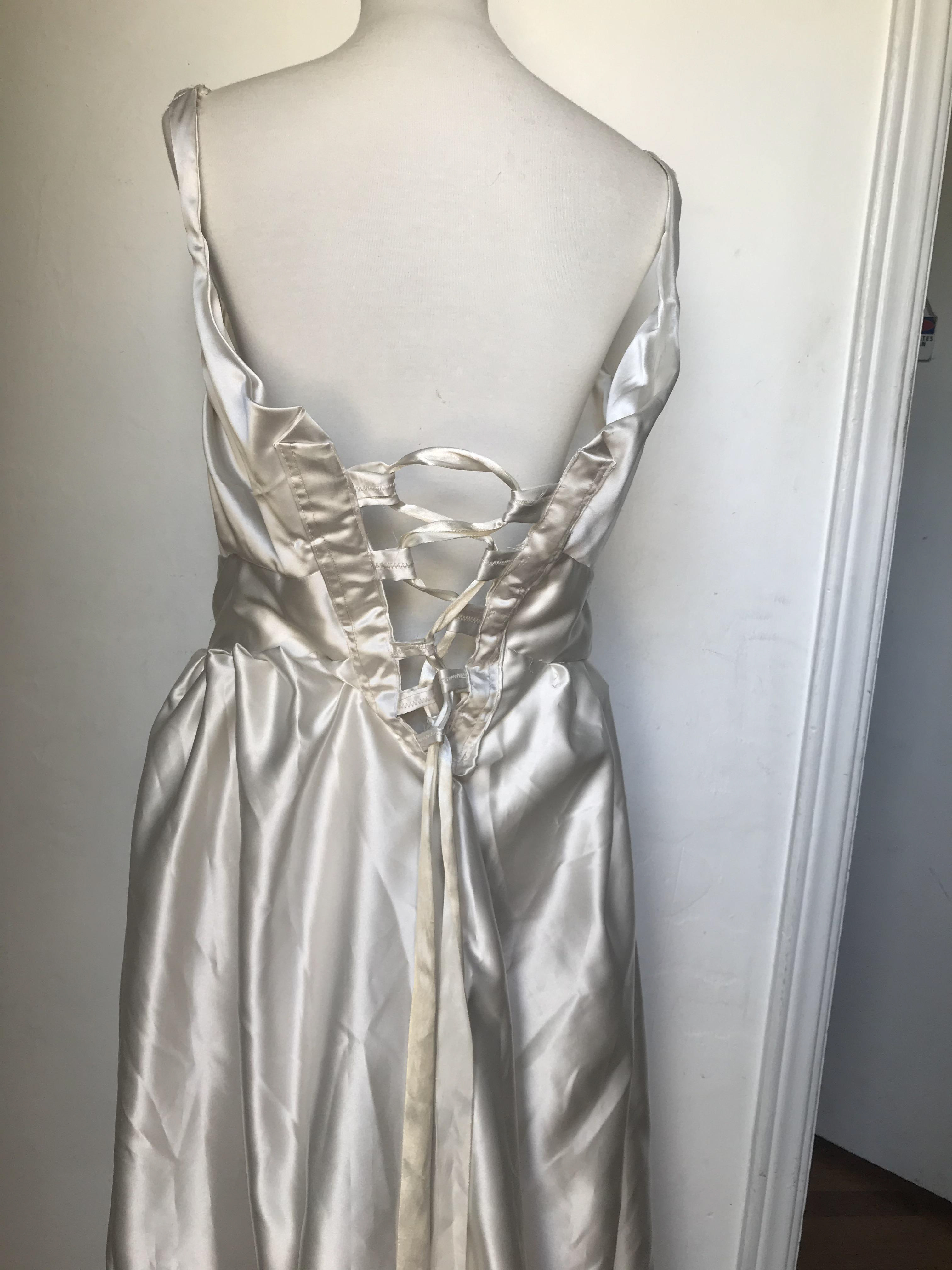Back of the dress, with laced corset.