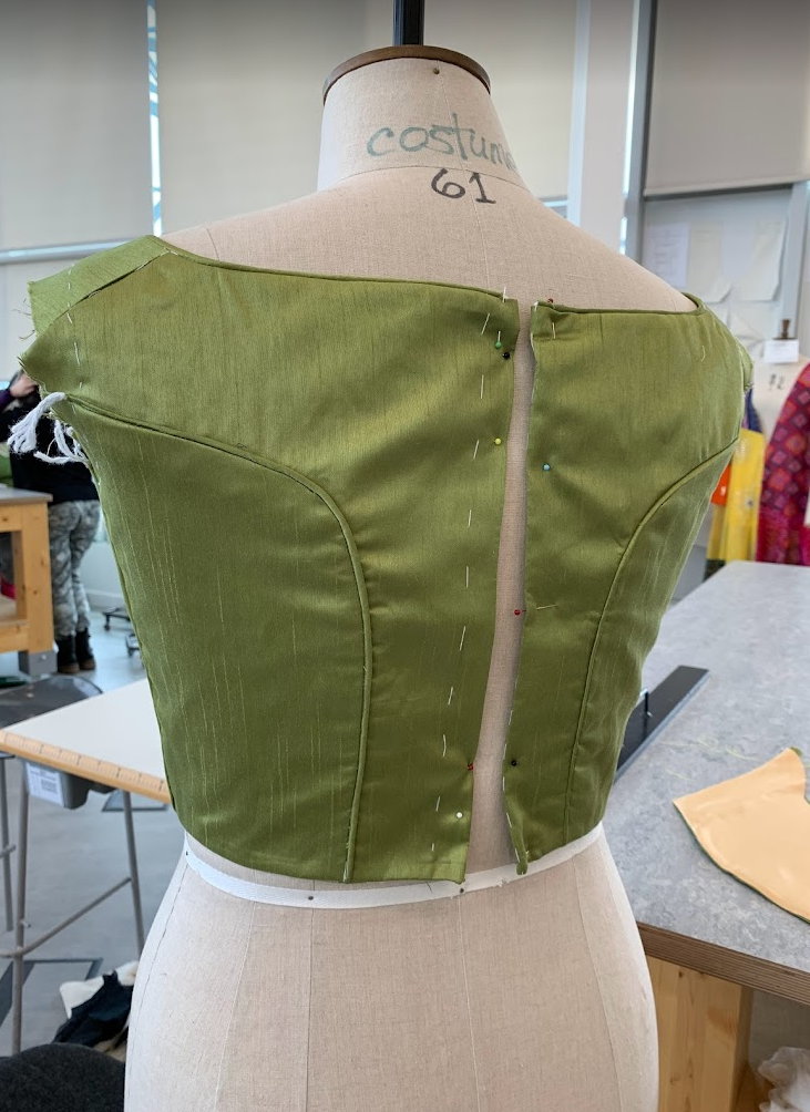 Back view of bodice with curved back seams
