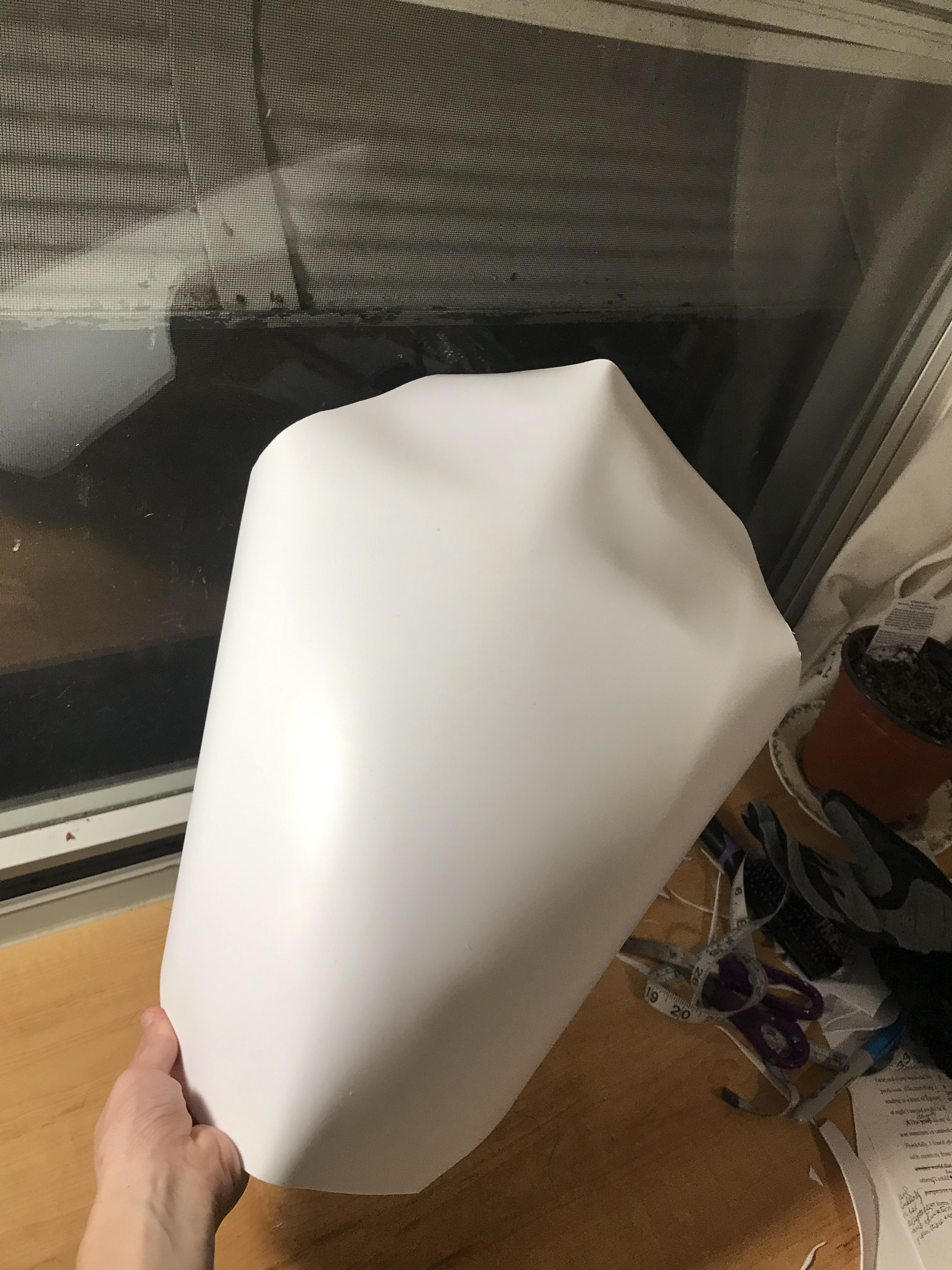 7. I then created similar shallow dents at the crest of the breastplate.