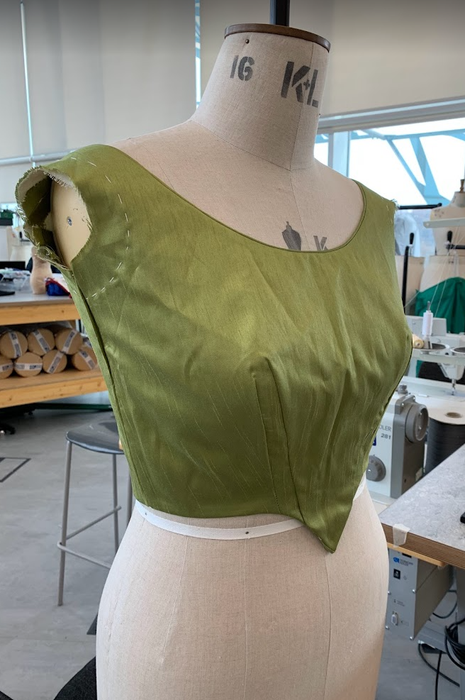19th c. bodice on the stand before sleeves were inserted.