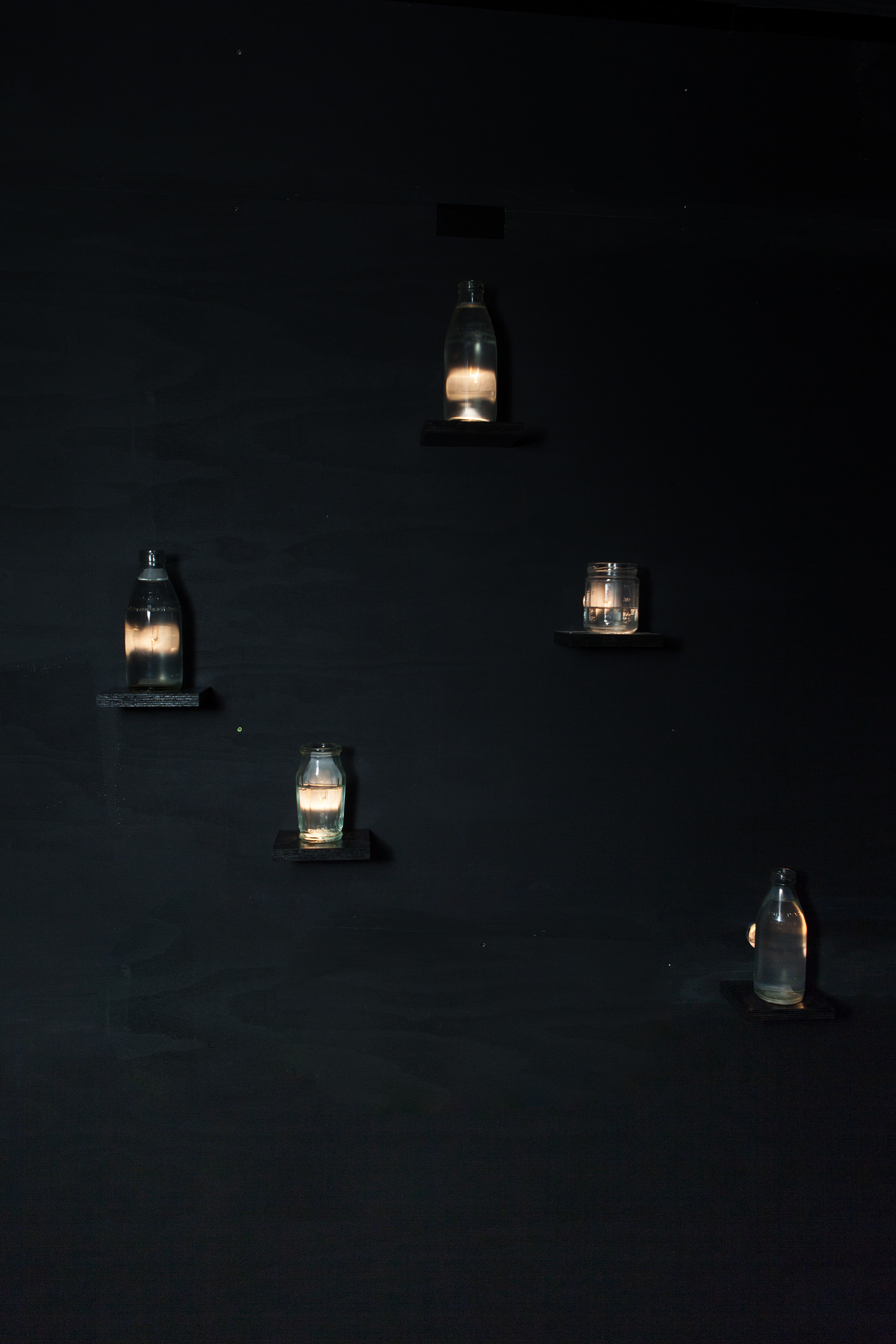 Everything flows, nothing remains I and II, found bottles, jars and garden taps, Murray River and Adelaide tap water, pump, lenses, fabric, timber and mixed media. 240 x 180 x 420 cm (Adelaide Experimental Art Foundation) and 240 x 120 x 330 cm (Murray Bridge Regional Gallery. Photography: Sam Roberts