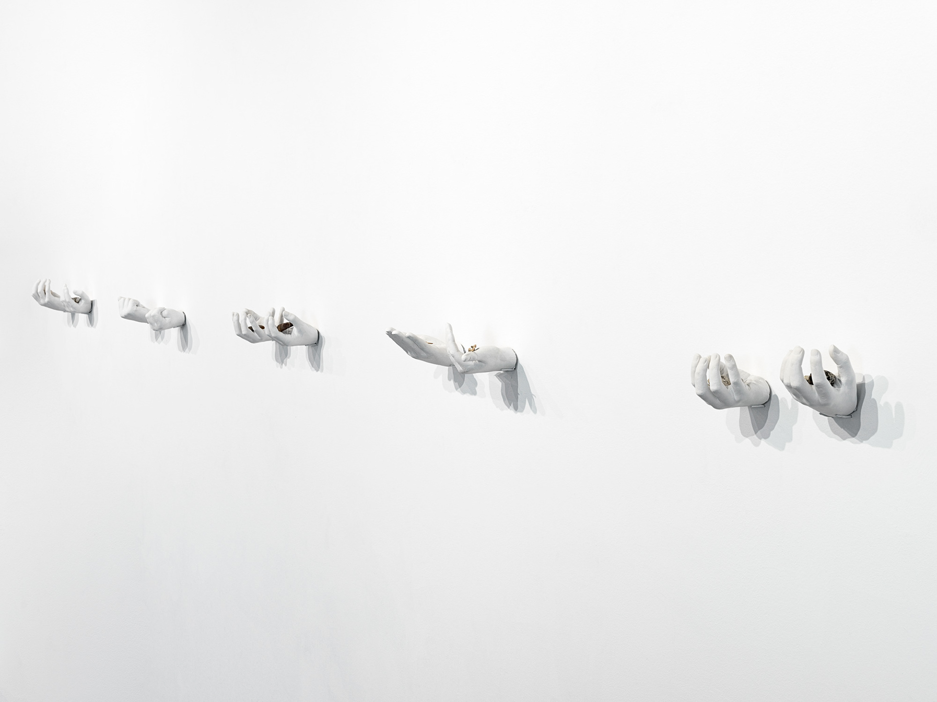 Heidi Kenyon I Able in the presence of rocks, 2021, hydrostone, found rocks and leaves. Each pair approx 7 x 21 x 12cm. Photography: Grant Hancock.
