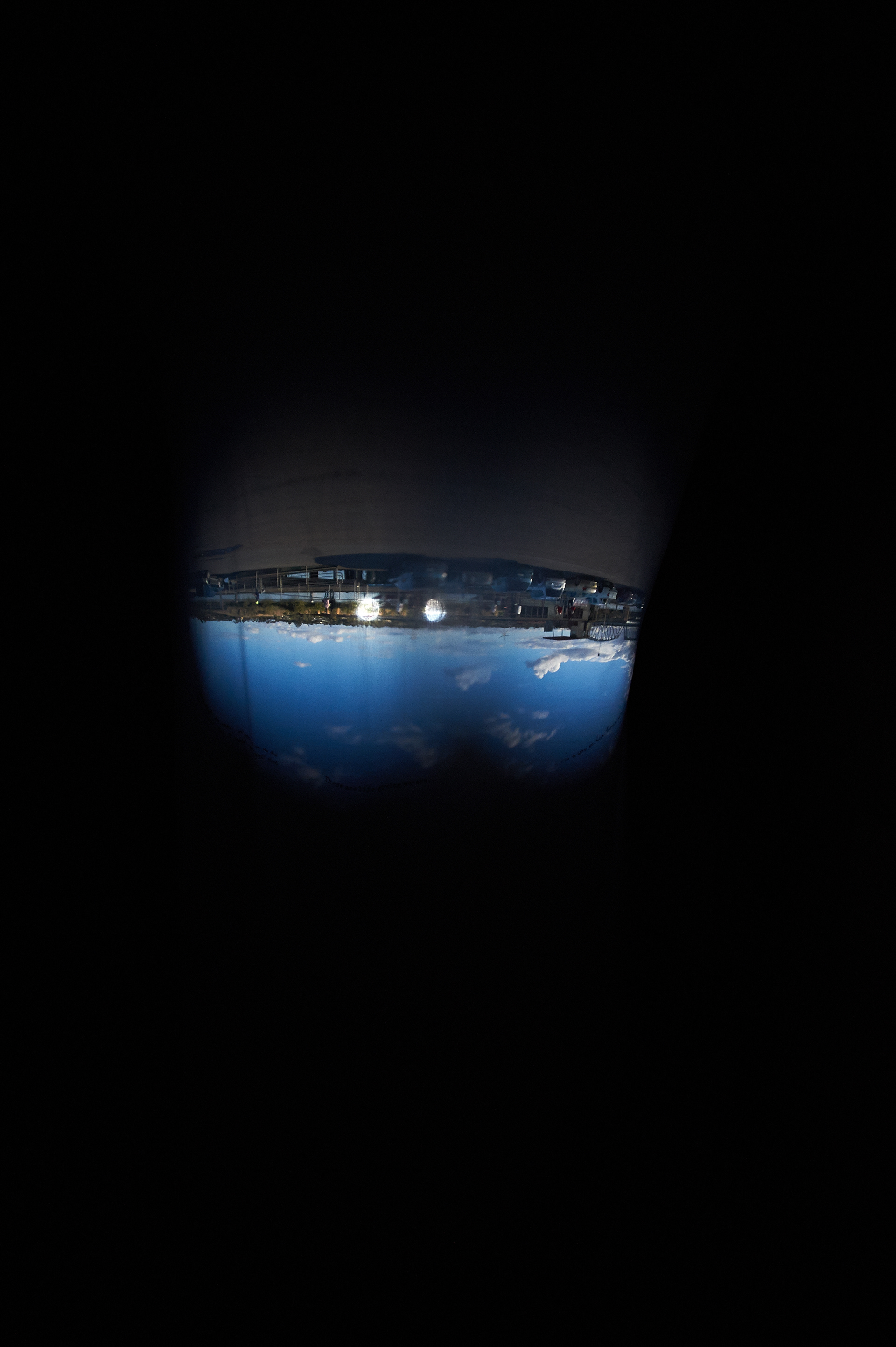 Turn Back to the River, 2013, Camera obscura (vintage telescope lenses and fabric), railway carriages, postcards and mixed media. Dimensions variable. Photography: Sam Roberts
