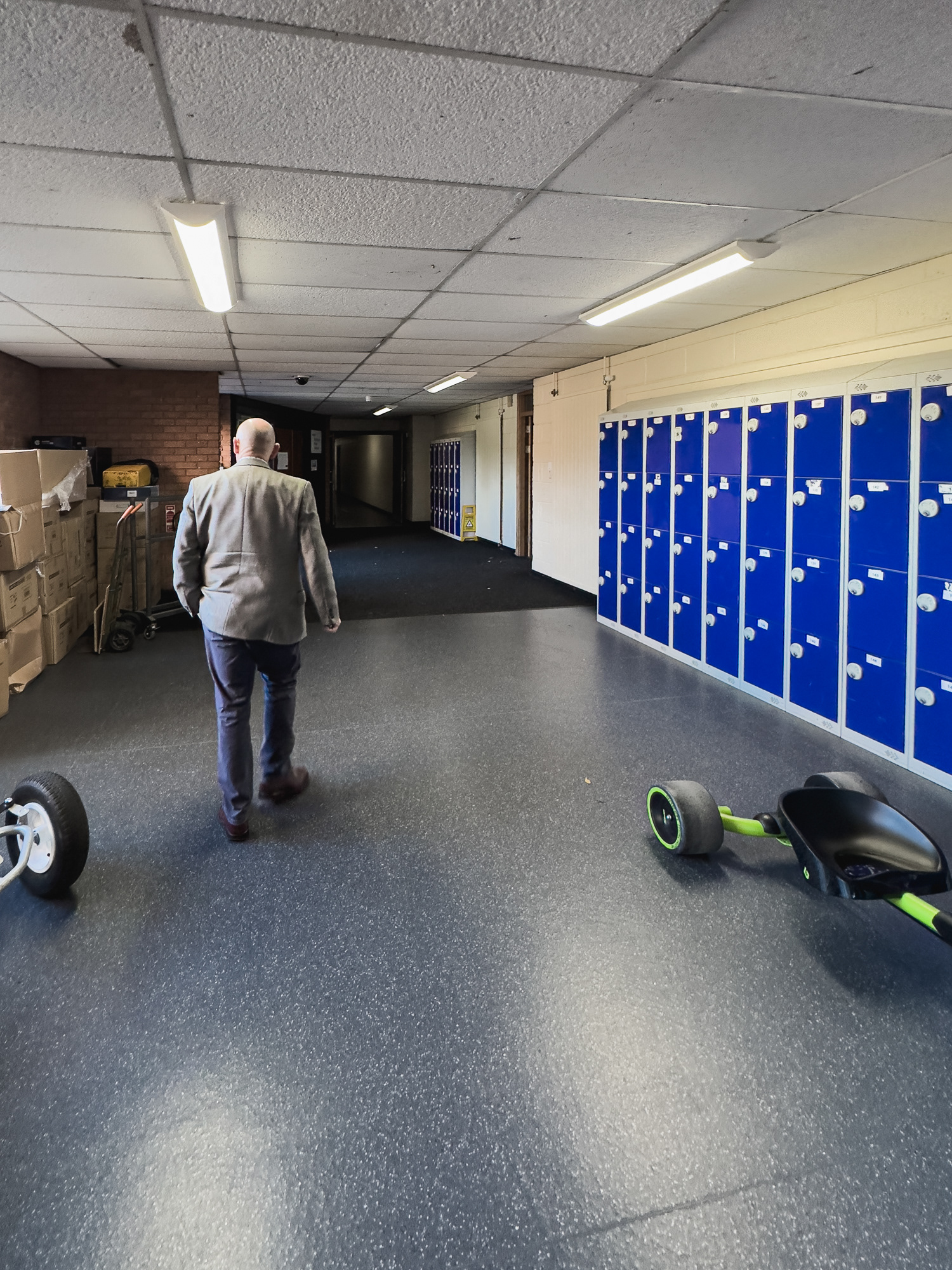 Down past the main hall, heading towards Art, Tech, Music and Science.