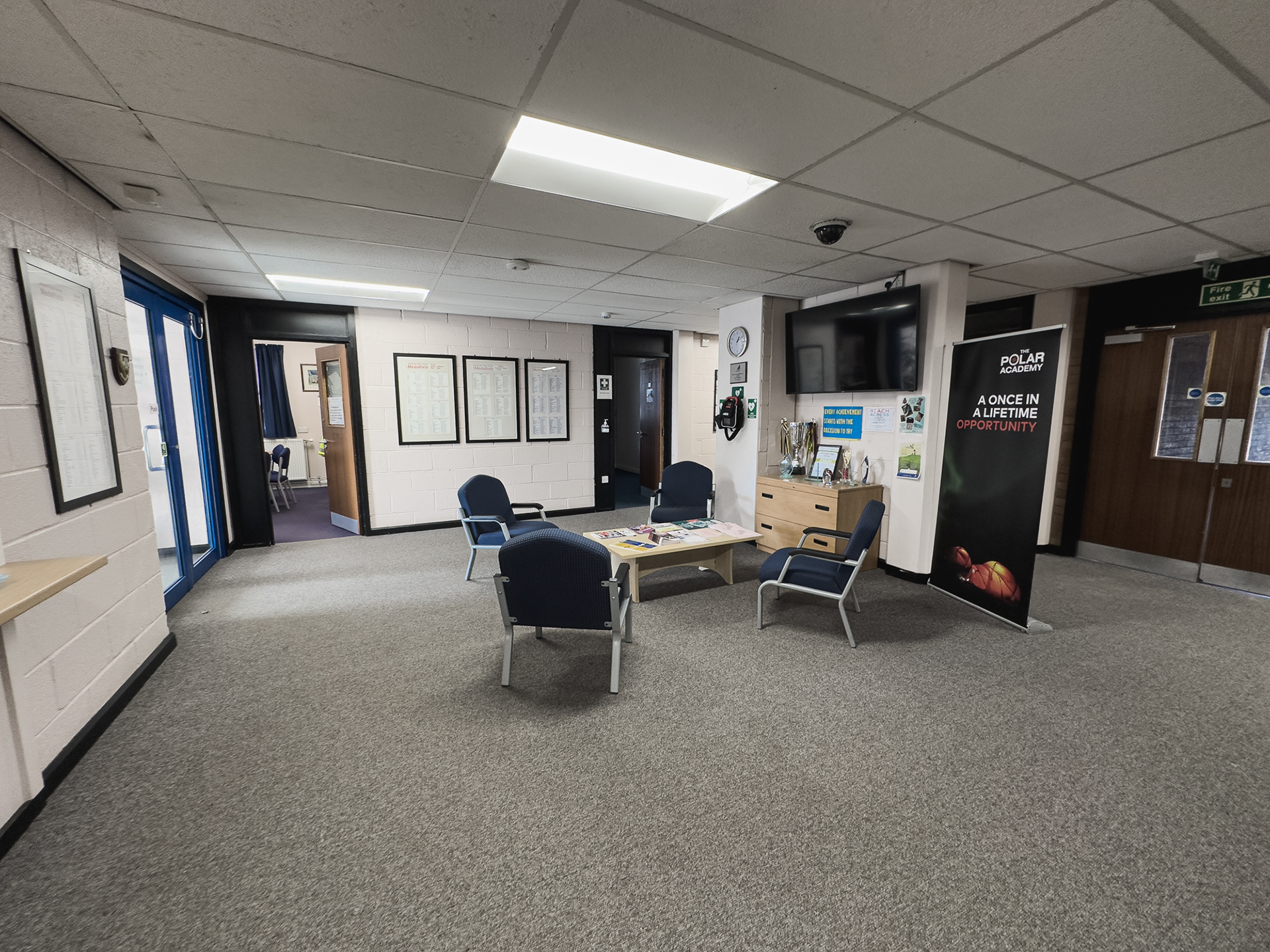 Reception Area - There used to a large glass display cabinet where the table and chairs are.