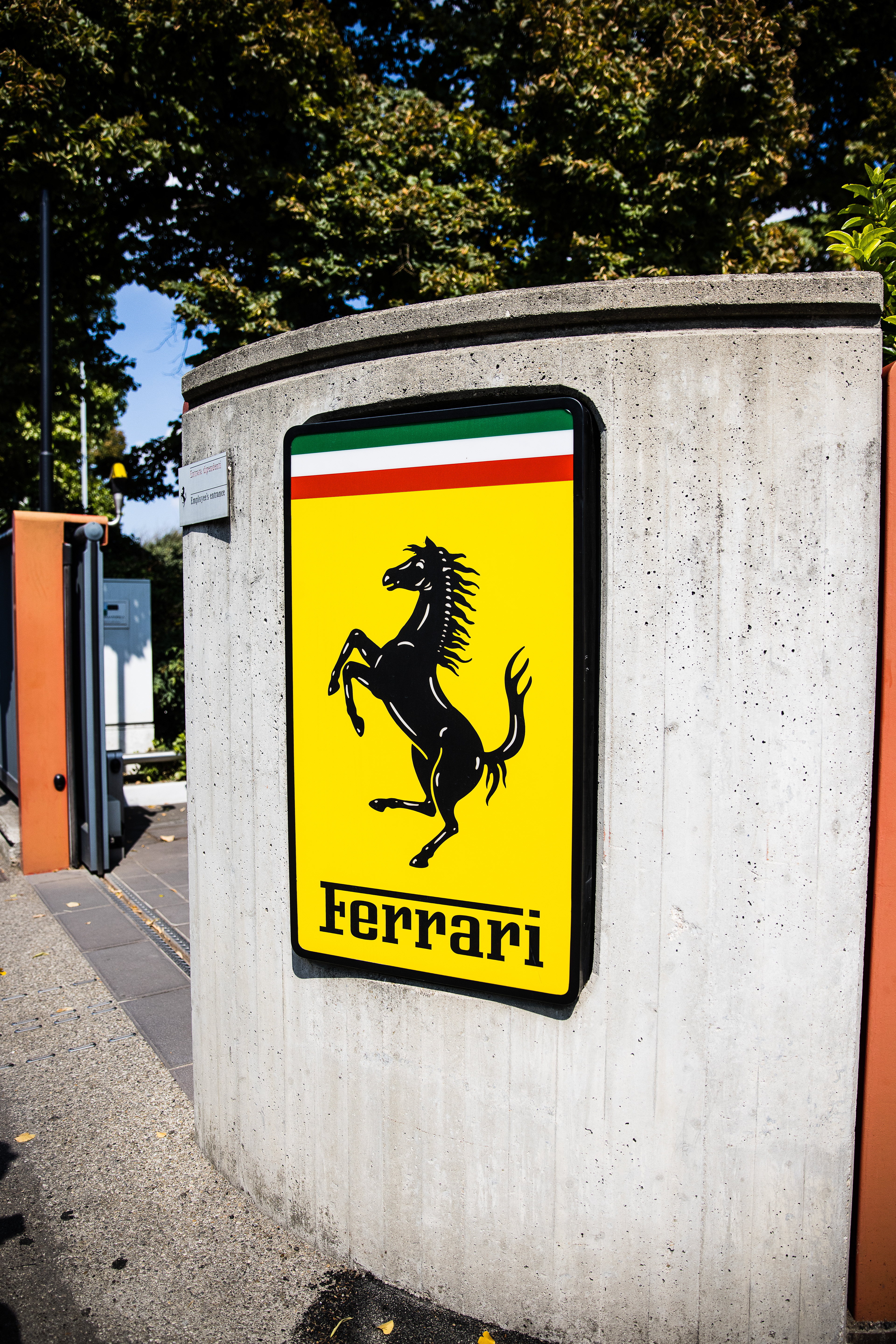 Ferrari logo at the factory entrance