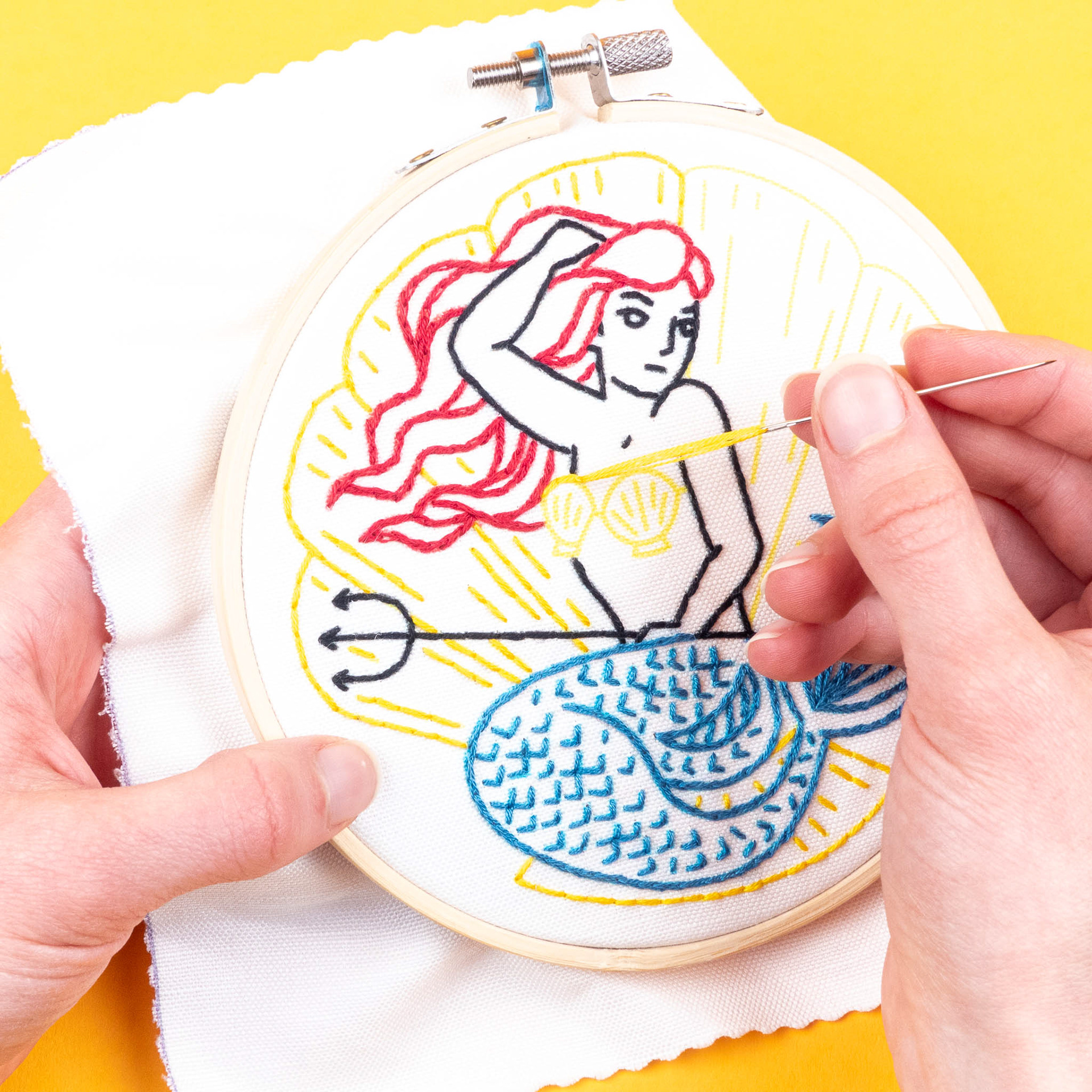 Mermaid being sewn