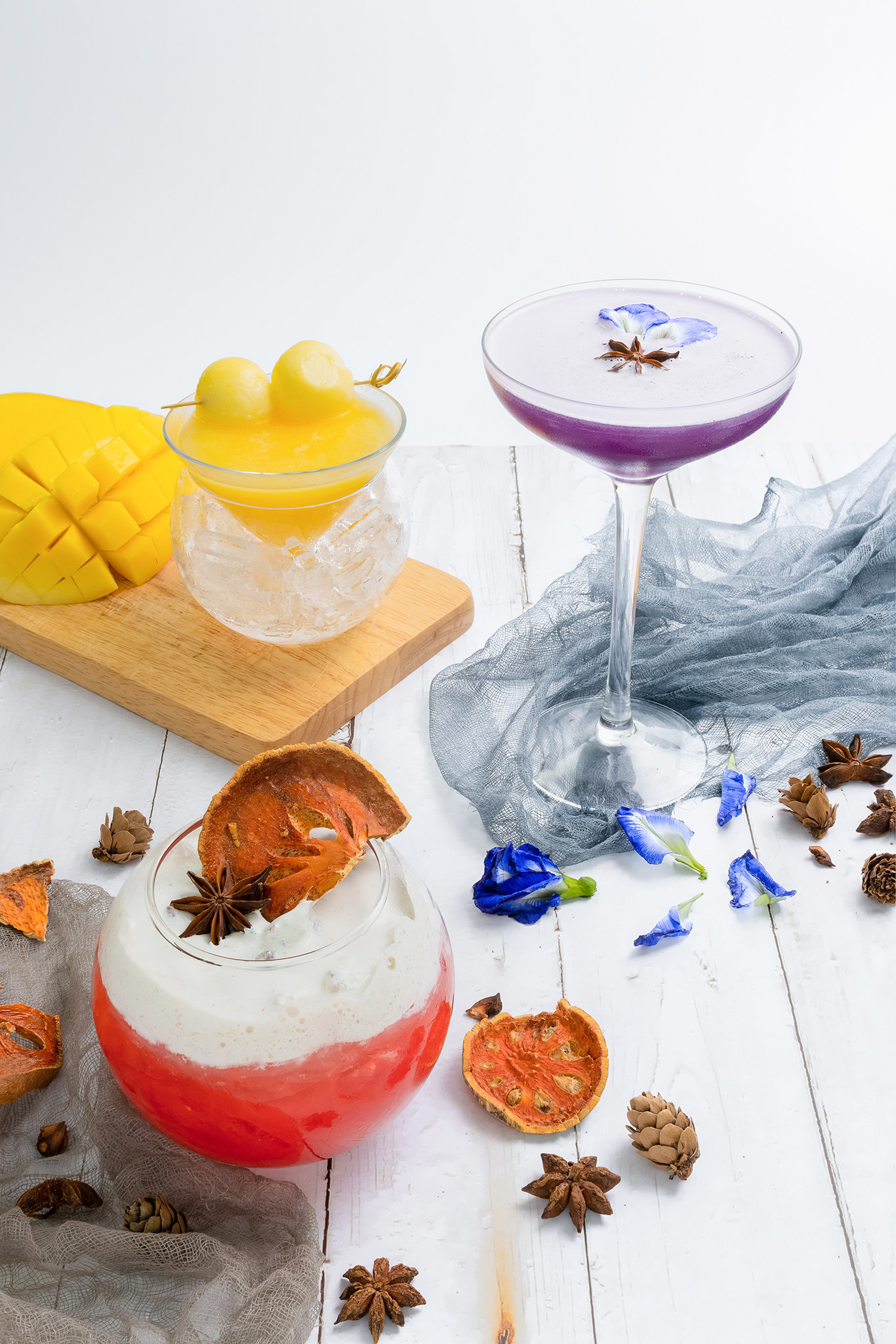 Butterfly Pea Tea, Coconut Mango-Tini and Whisky Blossom