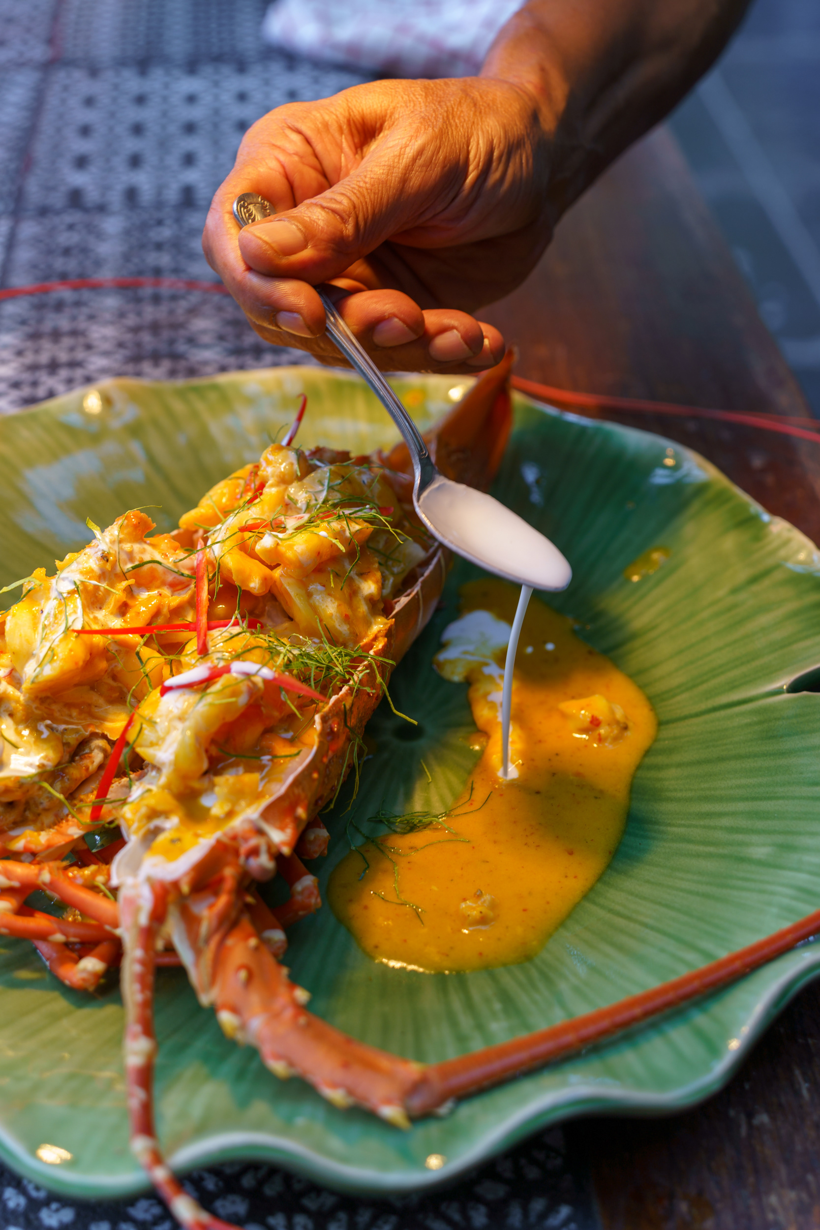 Chef at Ta Khai Restaurant Phuket Preparing Food