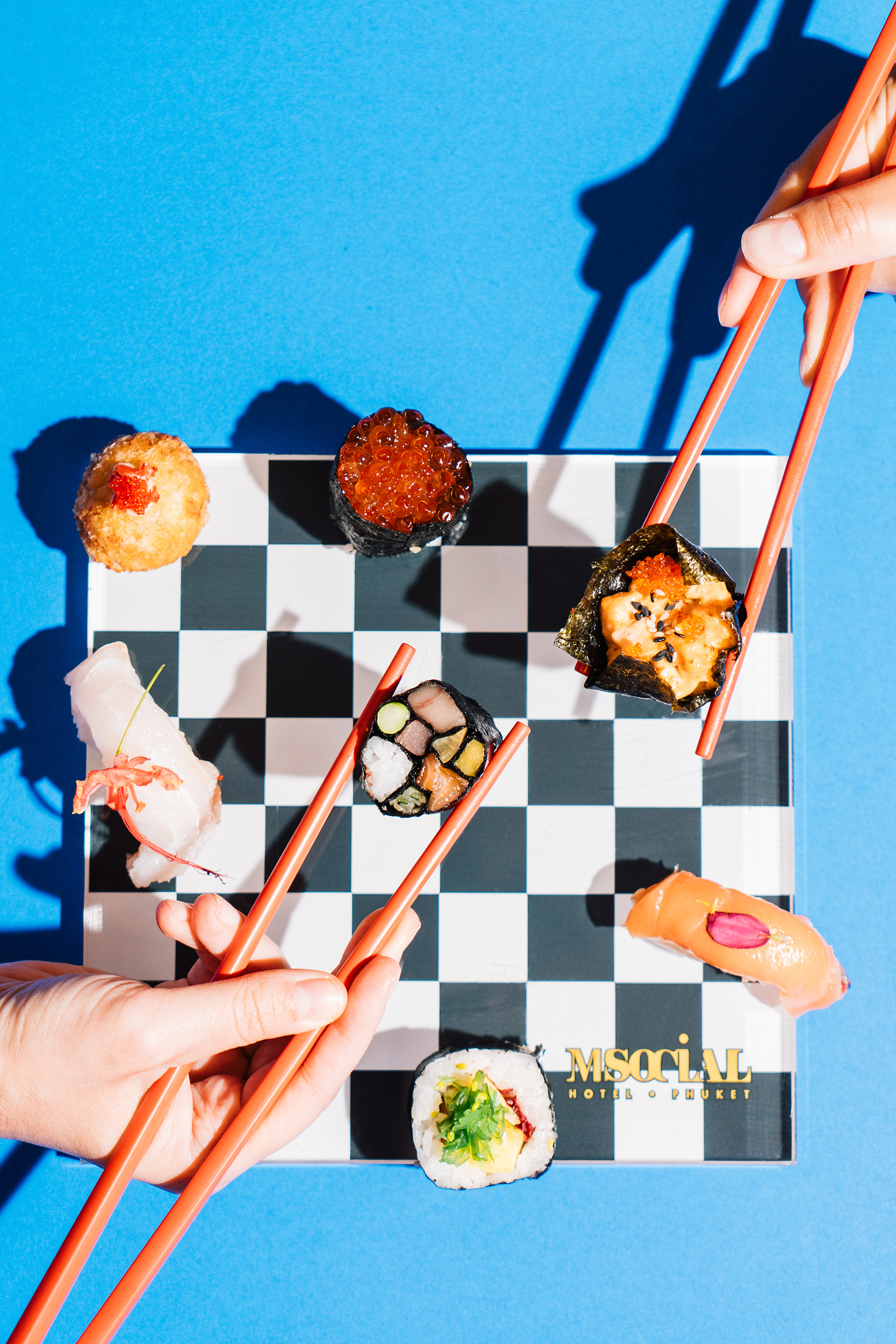 Creative photography of sushi on an blue background
