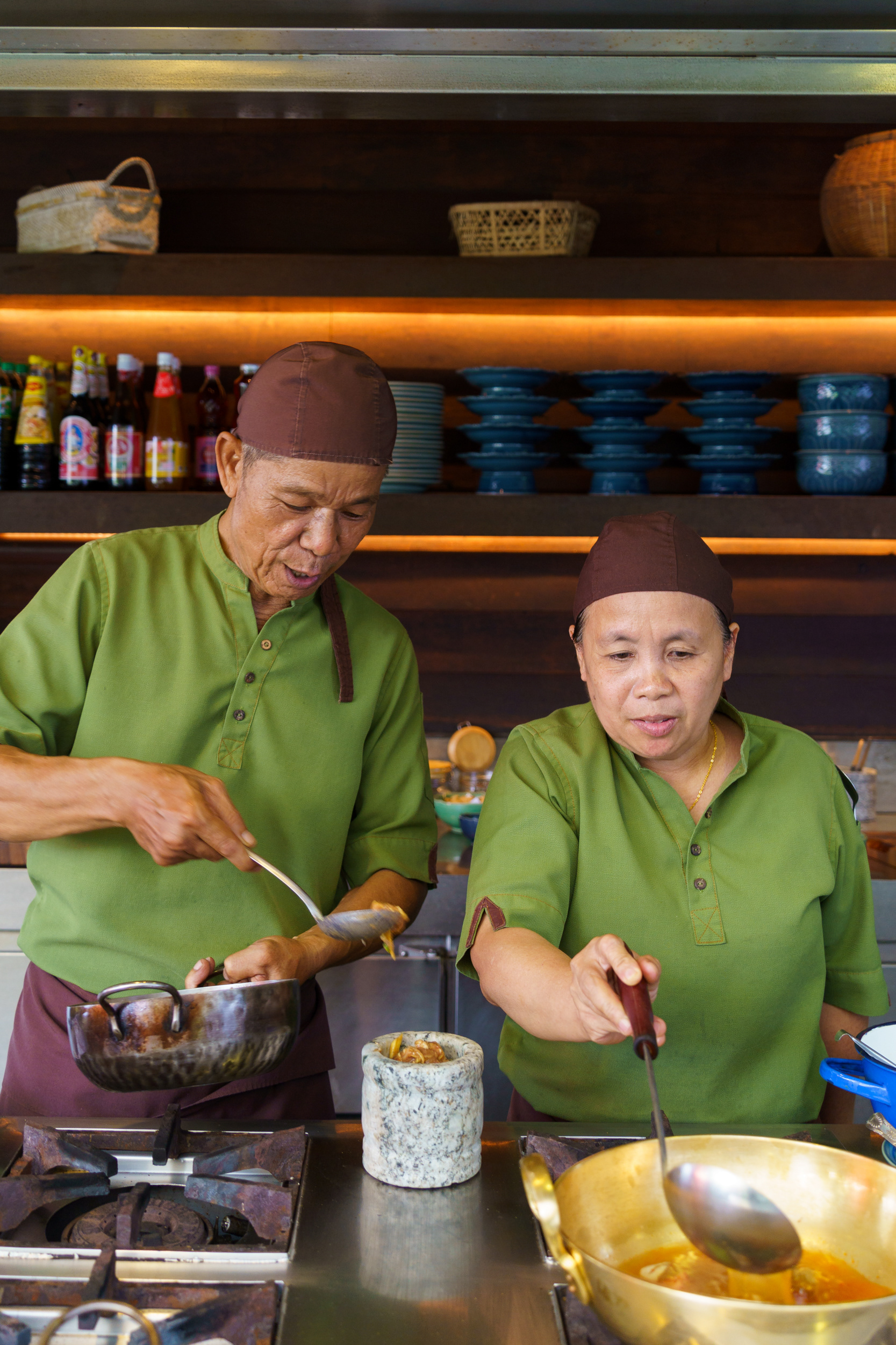 Chef at Ta Khai Restaurant Phuket Preparing Food