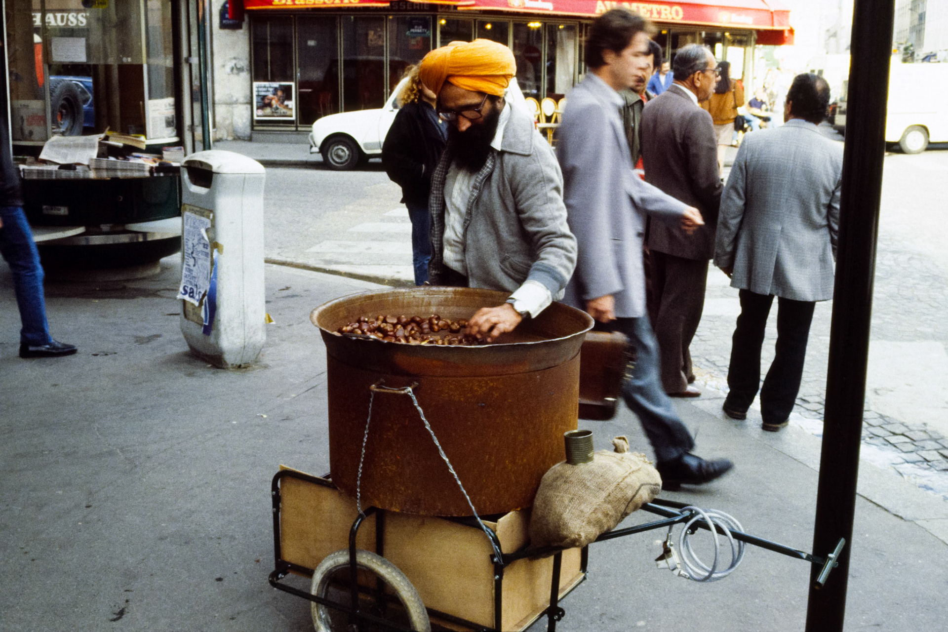 A man selling roasted chestnuts