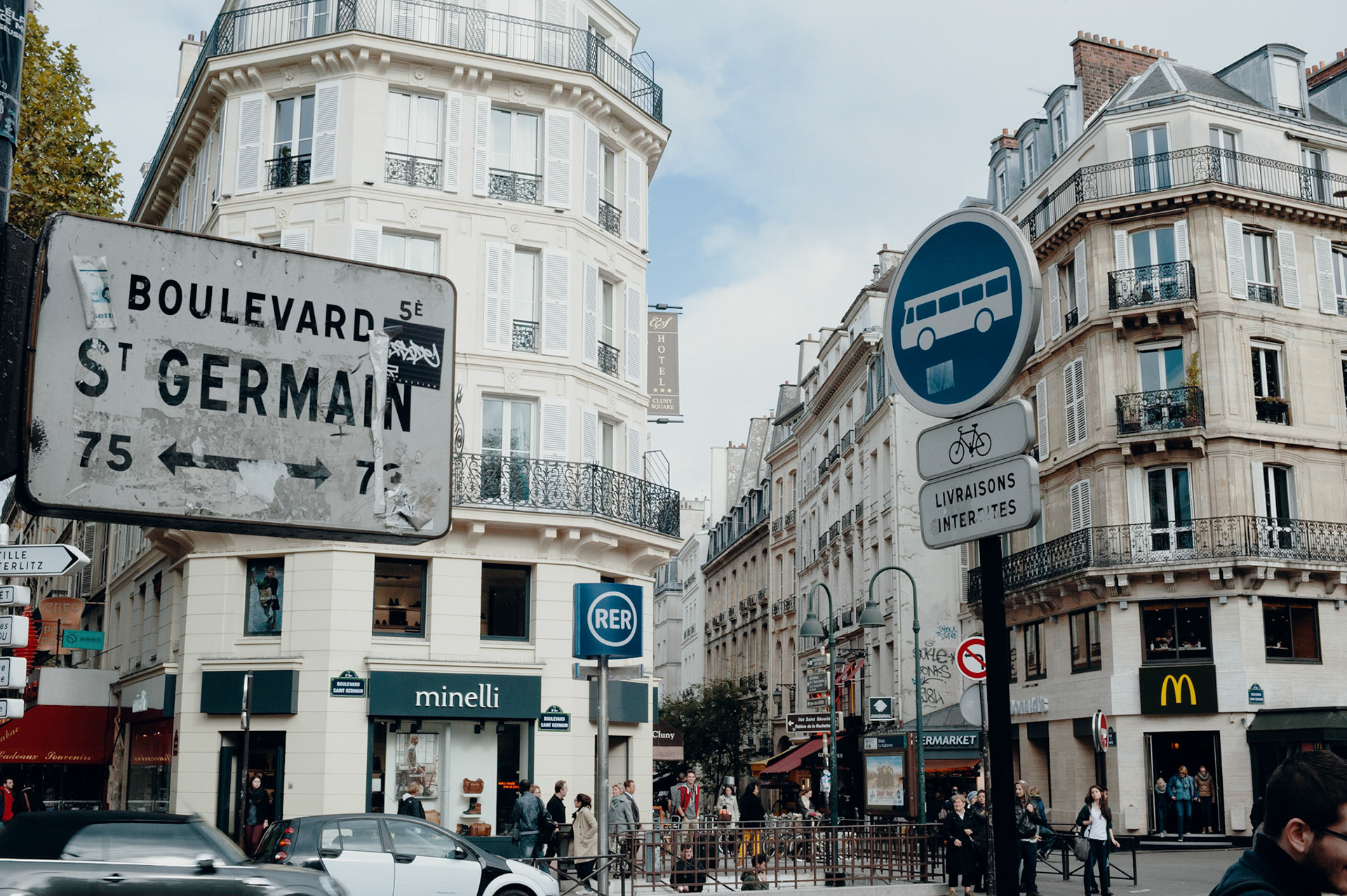 Signs at the intersection of Saint-Germain and Saint-Michel