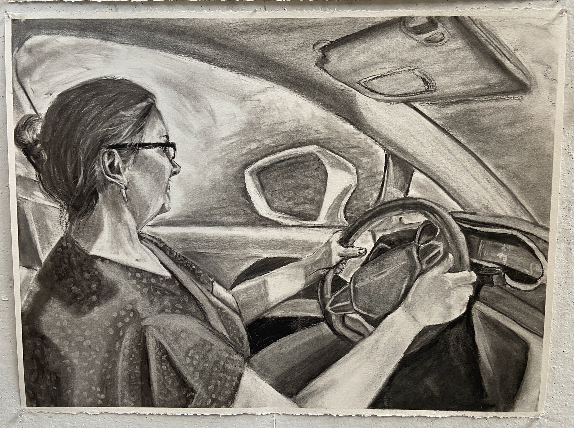"Mom in the Driver's Seat." Portrait in charcoal. Part of a series depicting the women in my family's predominantly female household.
