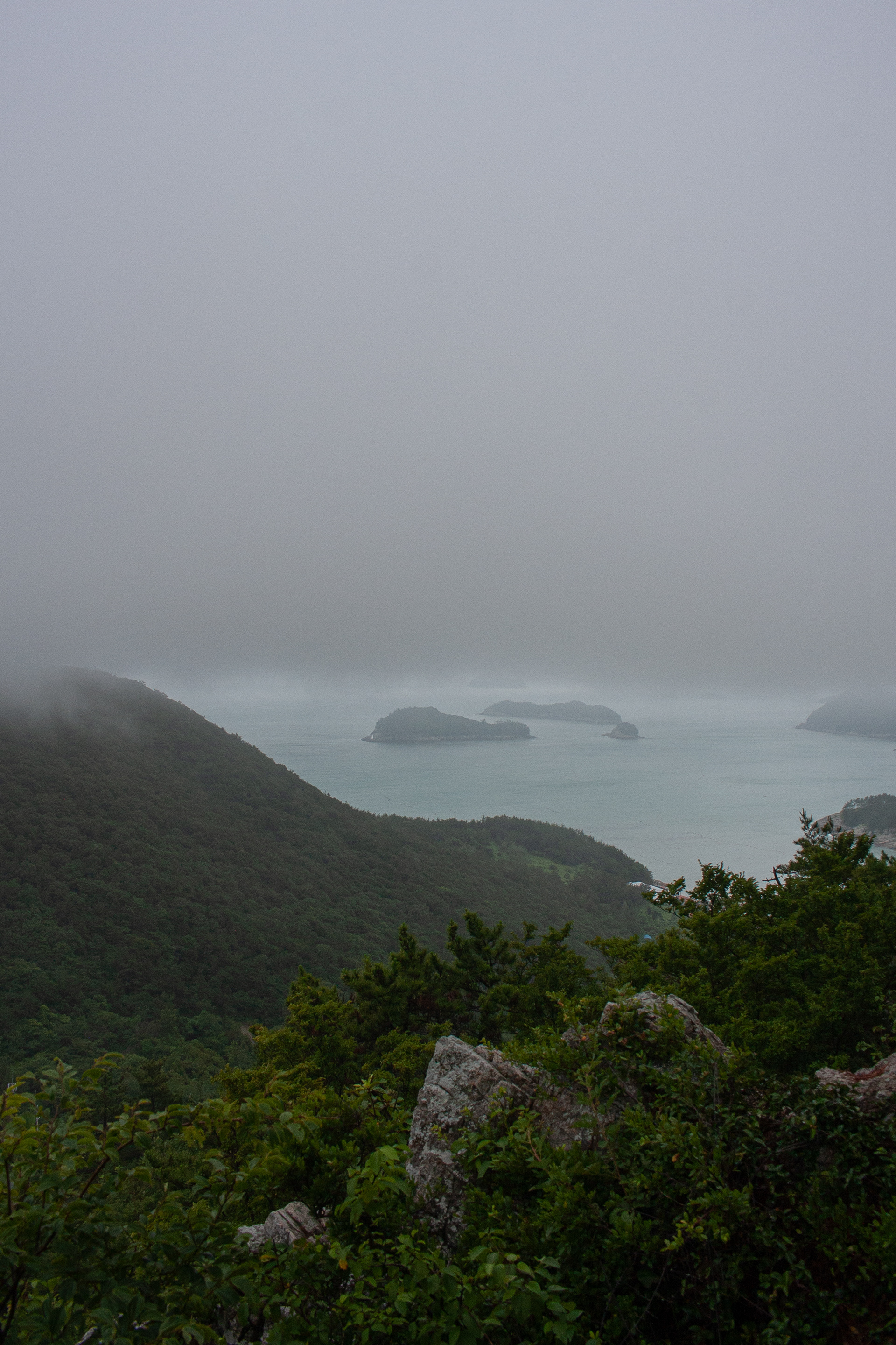 More islands appear as the fog rolls back