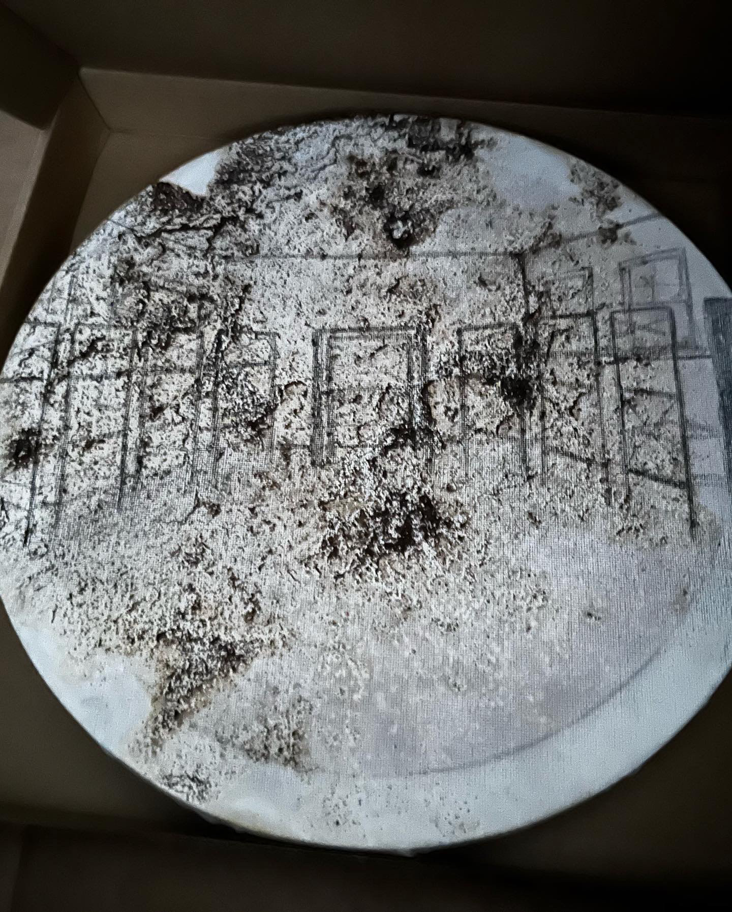 Distressed sketches through a combination of coffee grounds and burning whiskey poured over the canvas