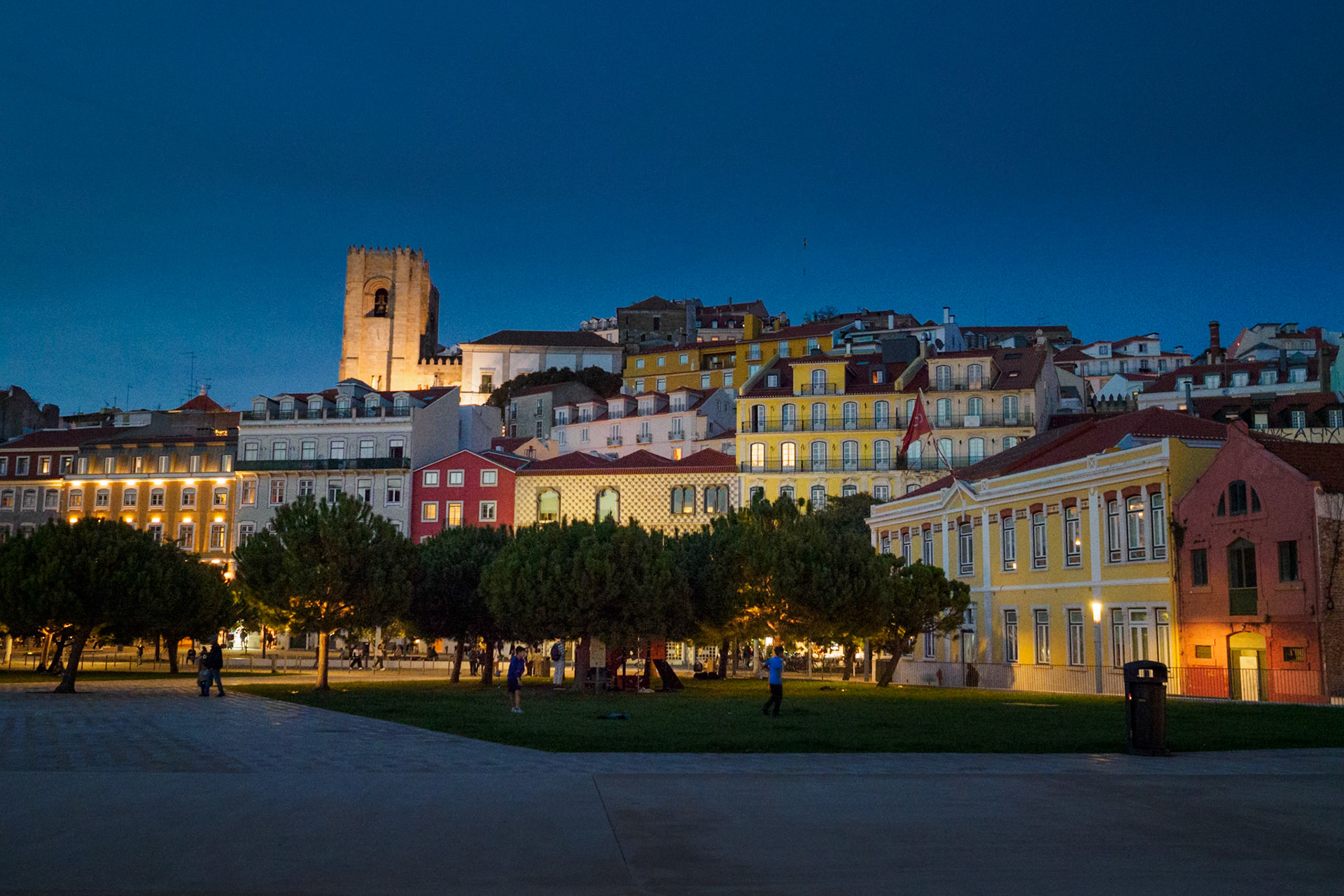 The Alfama neighborhood in Lisbon is the oldest part of the city, and this capture highlights the colours and textures of the old buildings and their facades, including the towers of the Lisbon Cathedral.