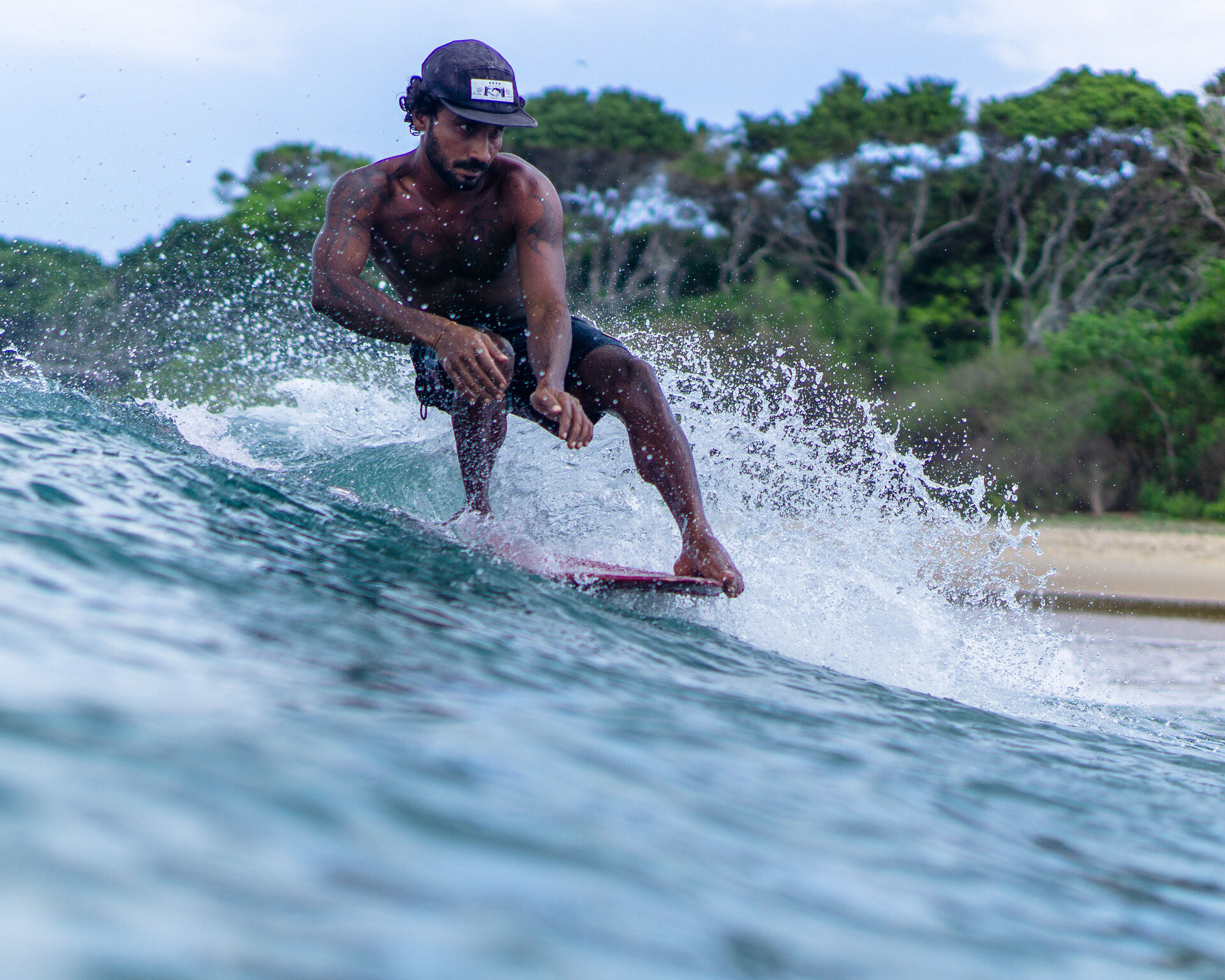 thillimayuranga riding a Bing surfboard at Baby Point Arugambay Sri Lanka