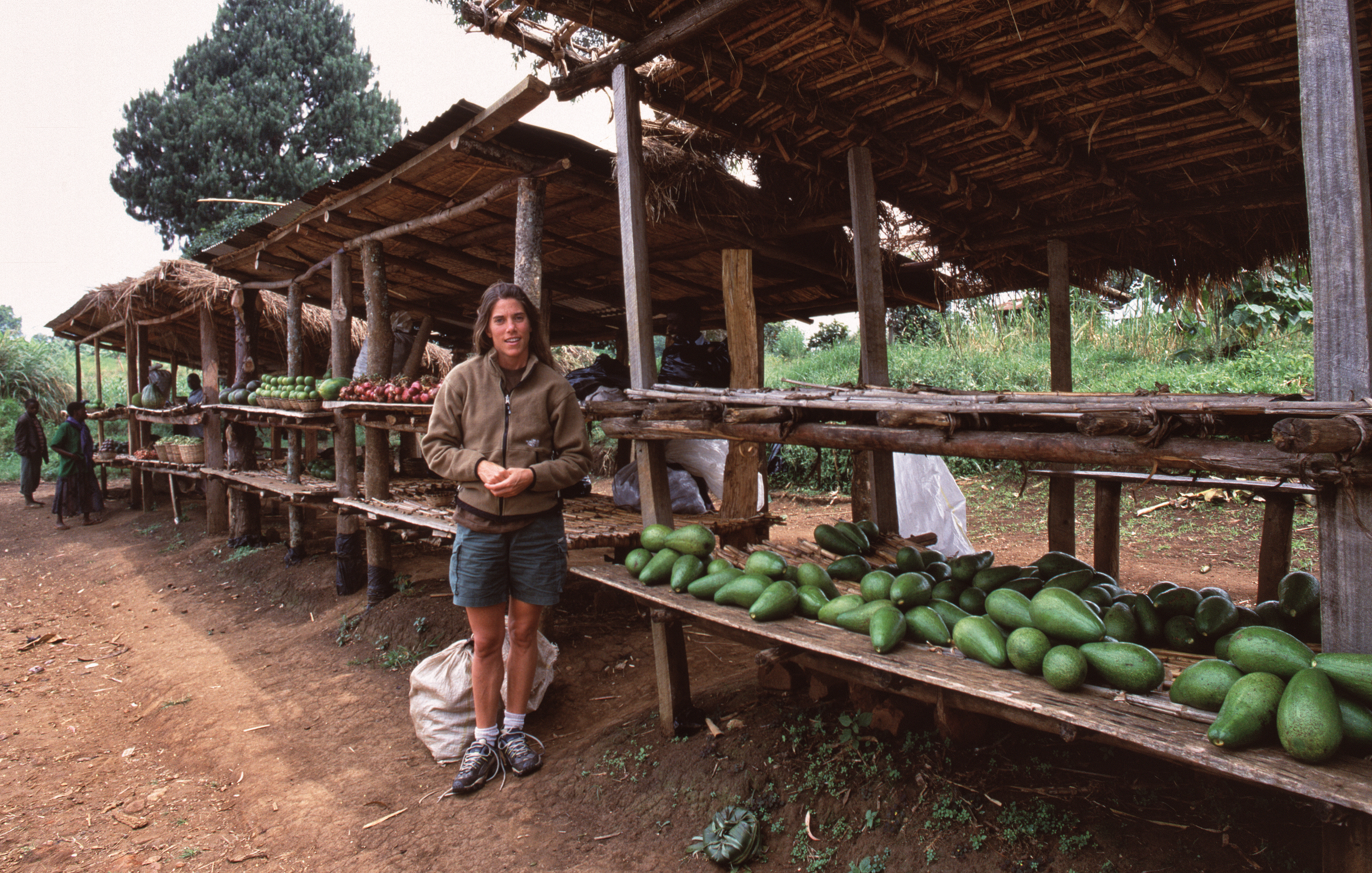 Robin buying Avocados at one of Uganda's many amazing roadside markets
