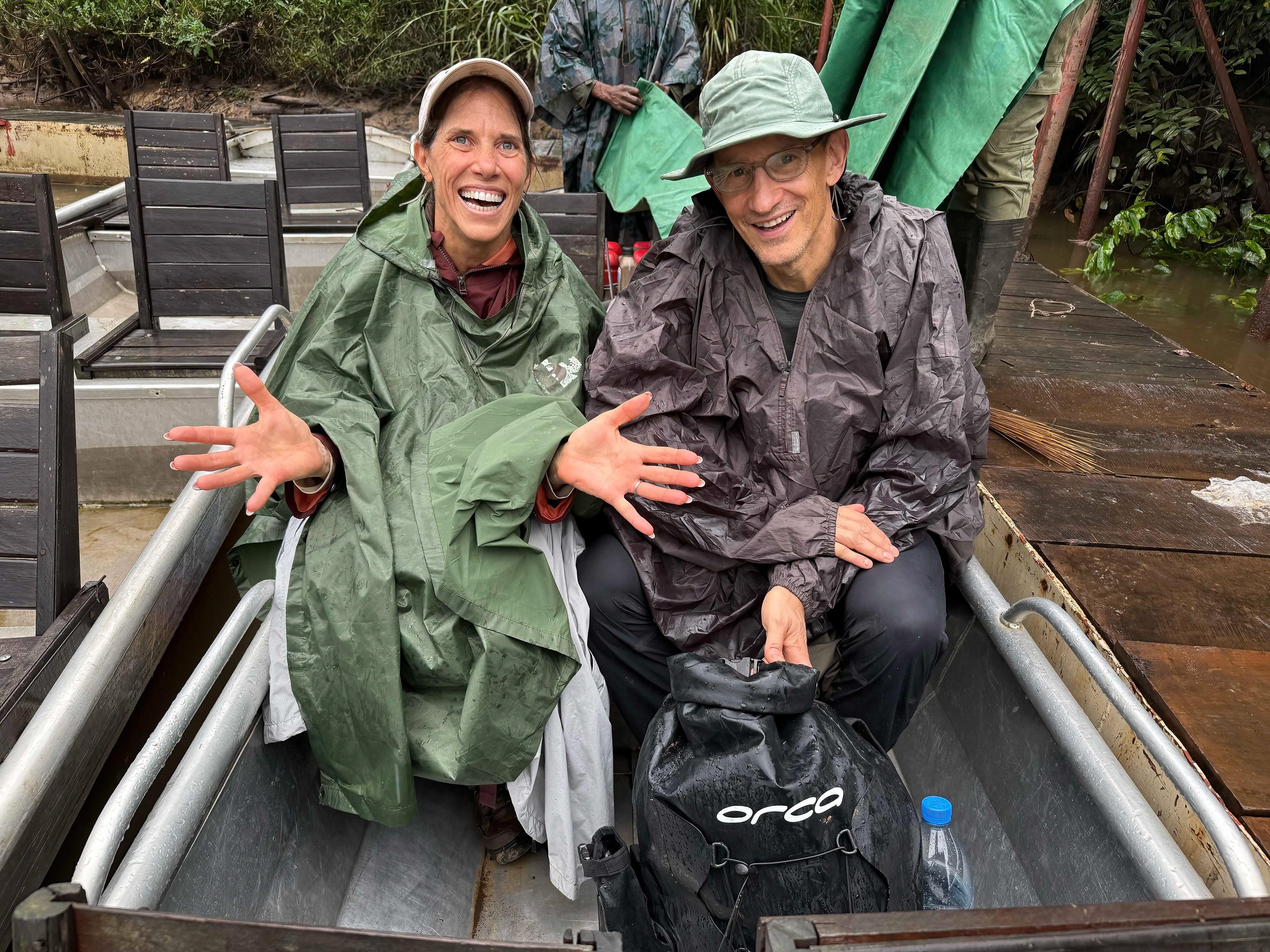 Robin and David prepared for a rainy trip on the Mambili River in Odzala-Kokoua National Park, Republic of Congo
