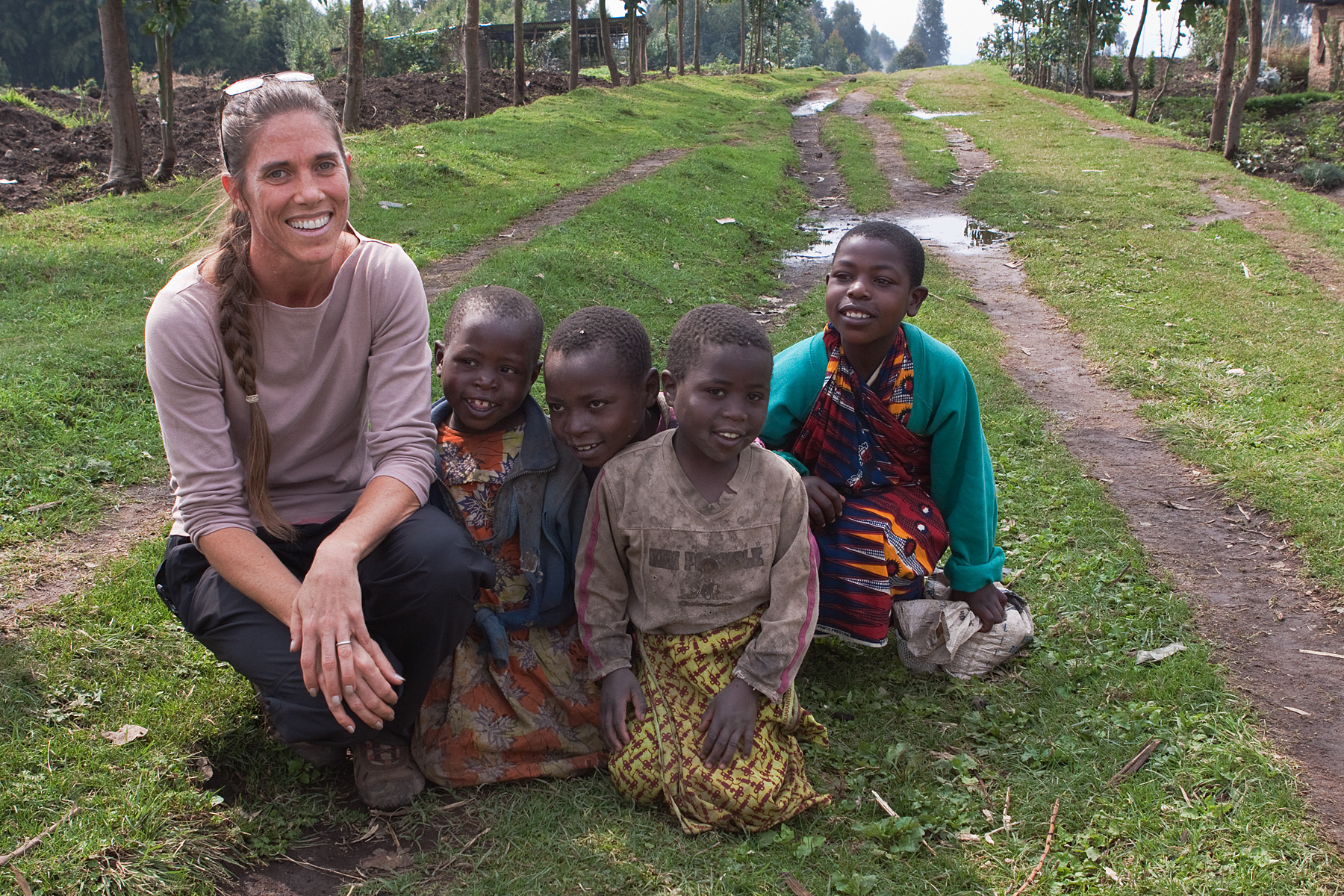 Robin meeting the local kids at the start of a gorilla trek - Rwanda