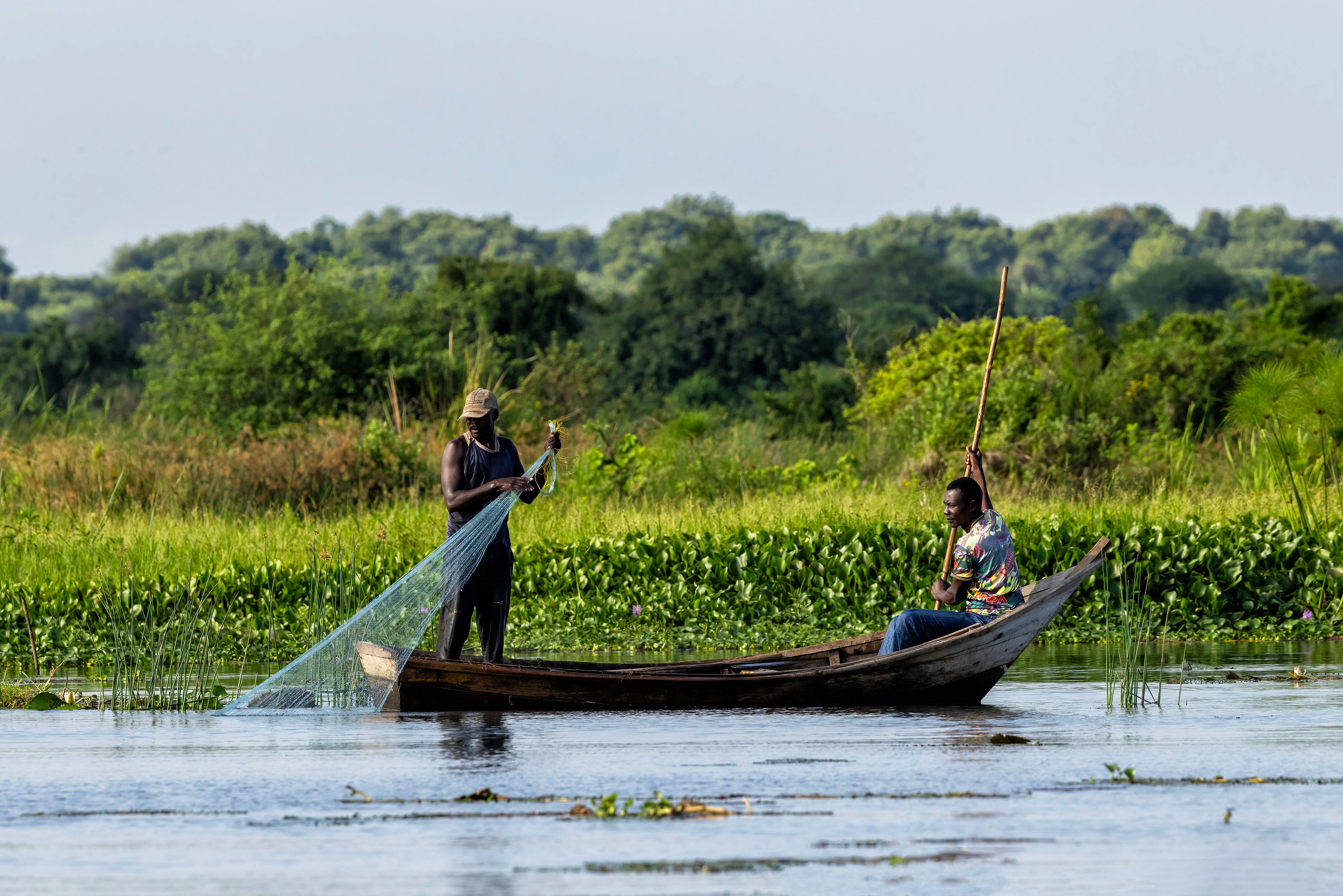 Fishermen at the edge of Lake Albert, Uganda - RM