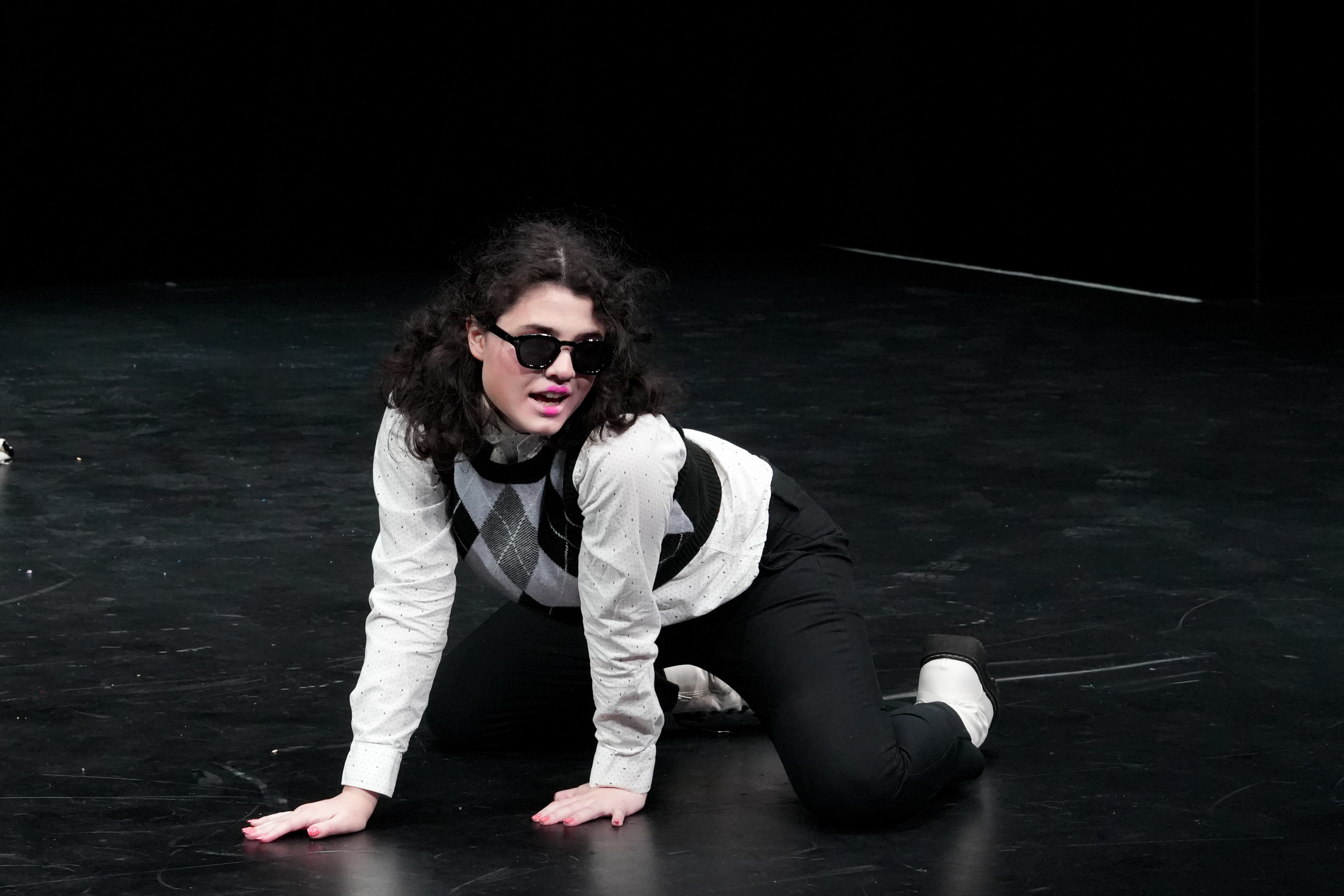 RIT Drag Club member Mary Annette performs to a mix of “Take on Me” by a-ha and “Never Gonna Give You Up” by Rick Astley during the orientation week drag show in Ingle Auditorium at the Rochester Institute of Technology in Henrietta, N.Y., Wednesday, Aug. 19, 2026.
