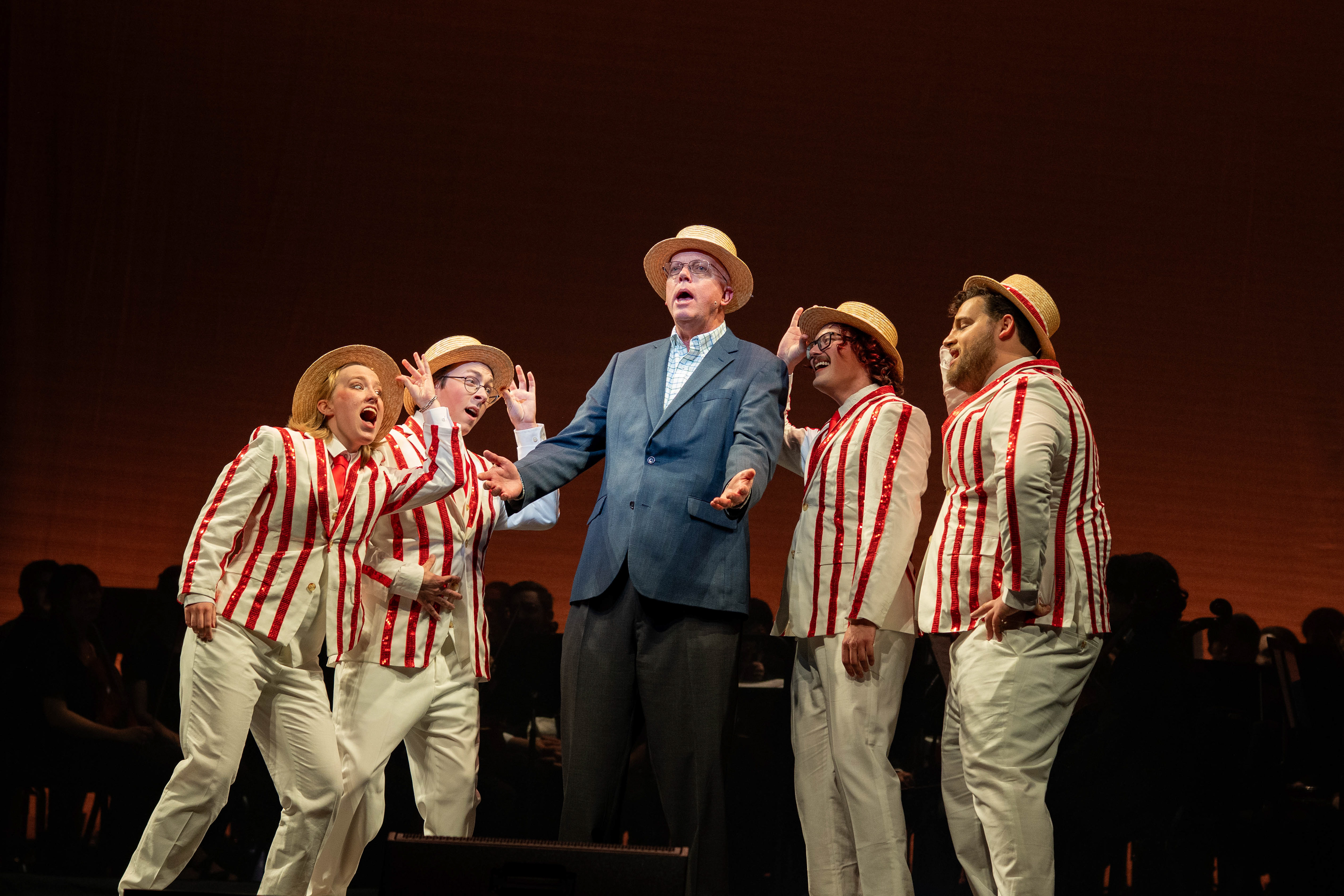 Former RIT president David C. Munson Jr. (center) and four RIT students perform during a dress rehearsal for “Till There Was You” in RIT’s Performing Arts Center on April 8, 2026.