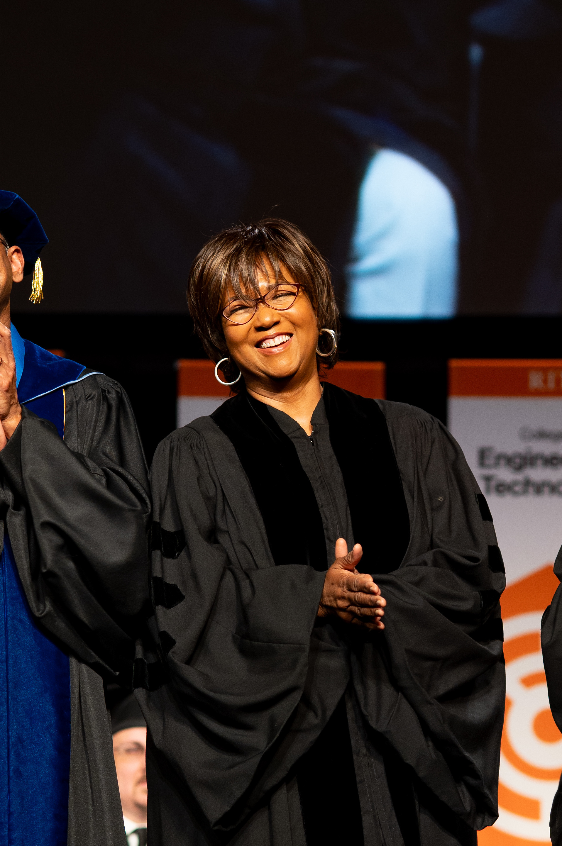 Mae Jemison, a former NASA astronaut, physician and educator, smiles as she is applauded on stage during the 2026 Academic Convocation in the Gordon Field House at the Rochester Institute of Technology in Henrietta, N.Y., Friday, May 8, 2026. Jemison delivered the keynote address and received an honorary doctorate during the ceremony.