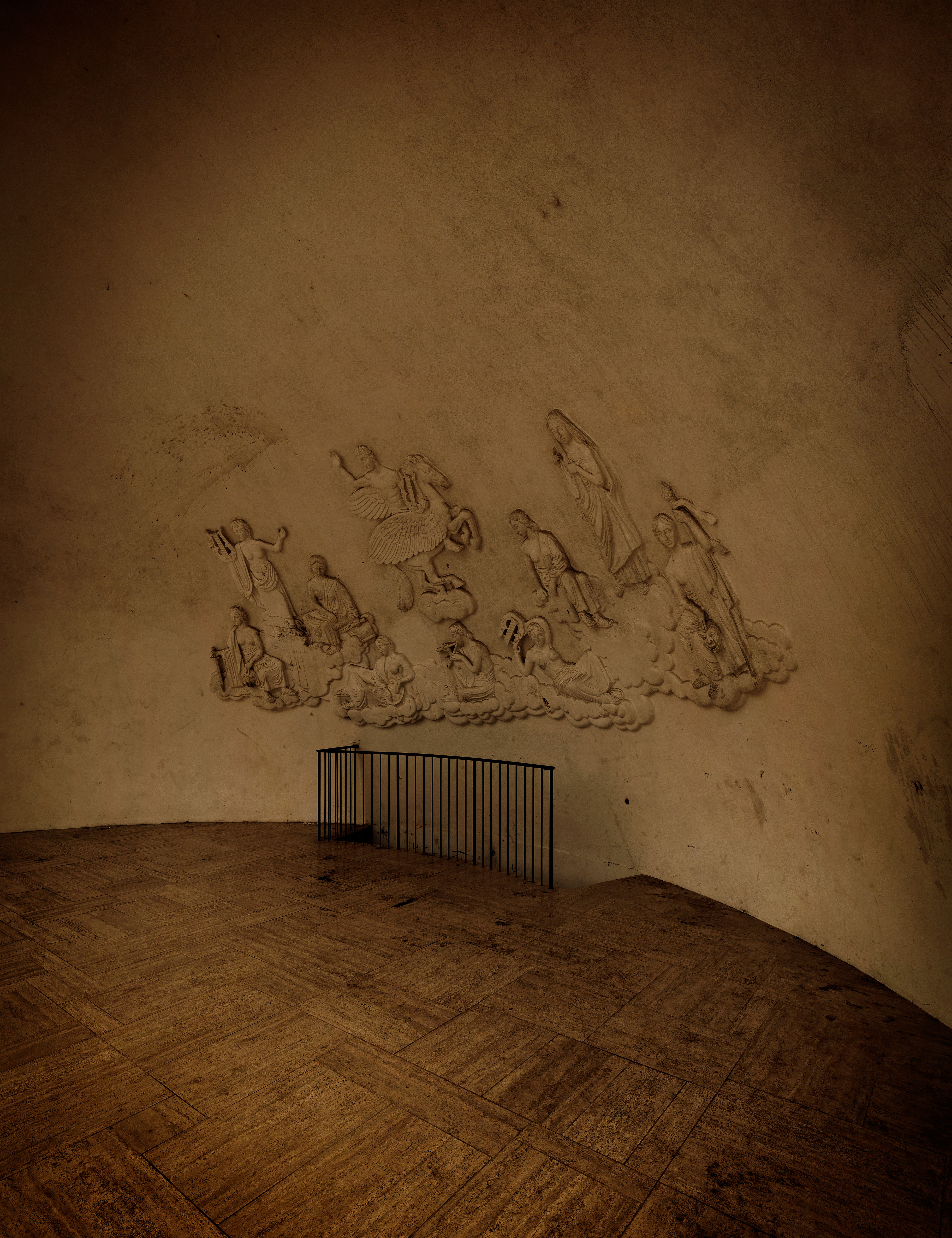 Trappe #2. Fine Art Photographic Print. 130x100cm. Beech frame with museum glass. Edition of 3 + AP. This bandstand was designed in 1927 by Arne Jacobsen while he was working for the City of Copenhagen’s architecture department under Poul Holsøe. Its simple copper-clad shell, shaped as a quarter-sphere, is designed to project sound forwards and stands on a stone pedestal forming a stage, with performers’ facilities below.