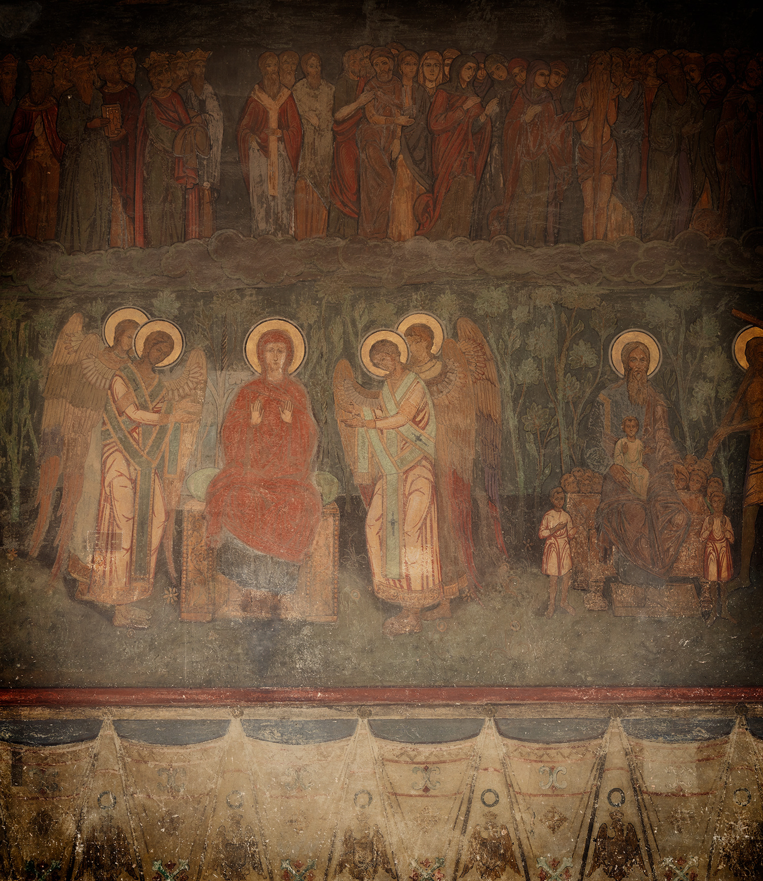The Patriarchal Cathedral of Saints Constantine and Helena was built between 1655 and 1659 under Prince Constantin Șerban, with a Brâncovenesc-style façade and frescoes painted by Dimitrie Belizarie in 1923. The Brâncovenesc style combines Byzantine, Ottoman and medieval influences with distinctive porticos, trilobed arches, columns and intricate vegetal ornamentation, often incorporating groups of three symbolising the Holy Trinity.