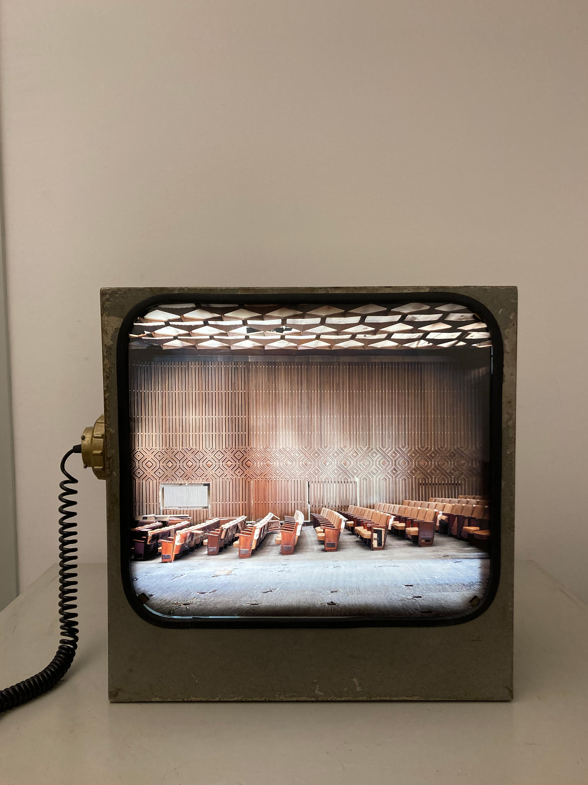 Omnia #2. Backlit photographic print. Mid-20th-century industrial projector. 52 × 50 × 24 cm. Unique piece