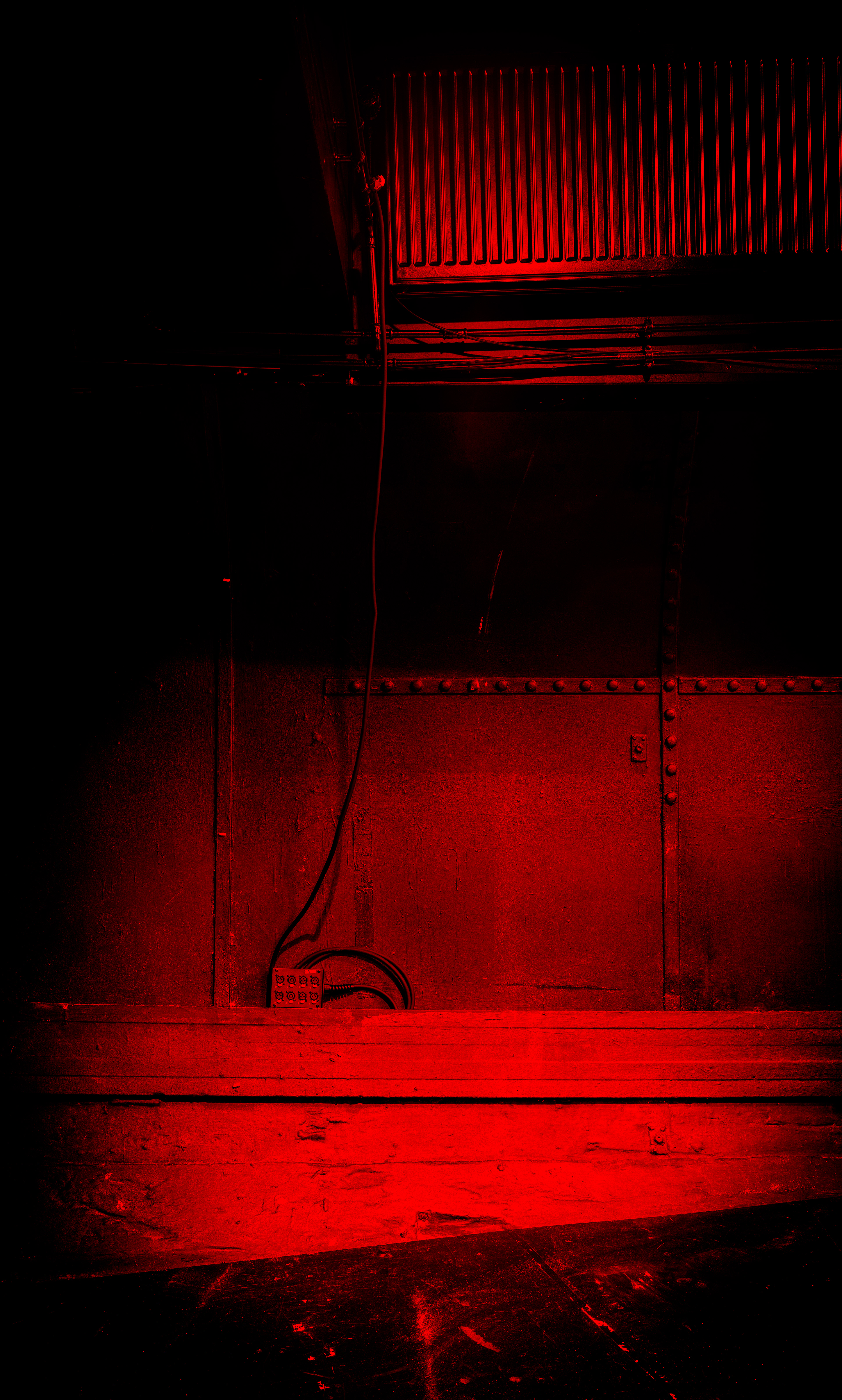 Rød#4. Backlit photographic print in an industrial metal container. 31x51cm. Unique edition. Badteater is dedicated to developing puppet and animation theatre for adults, creating a magical and playful world in contrast to conventional interpretations of classical and philosophical texts. Its unique character is also defined by its unusual setting: the theatre is located on a ship.