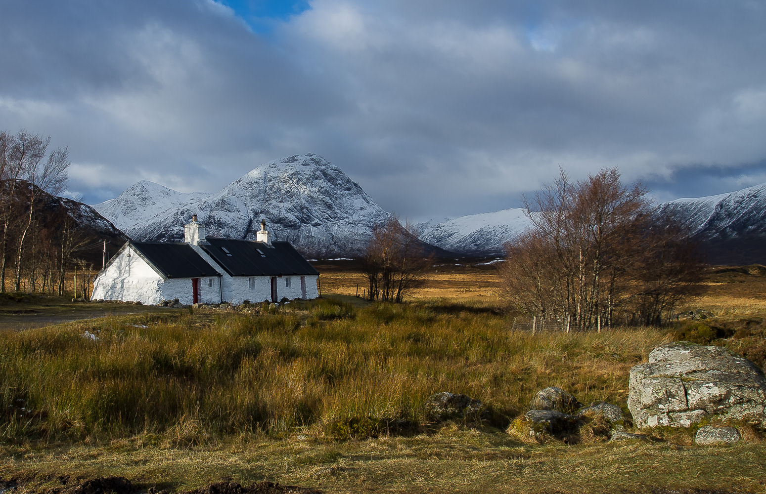 Photo of Another view of Blackrock cottage in November with the snow covered Buachaille Etive Mor in the background