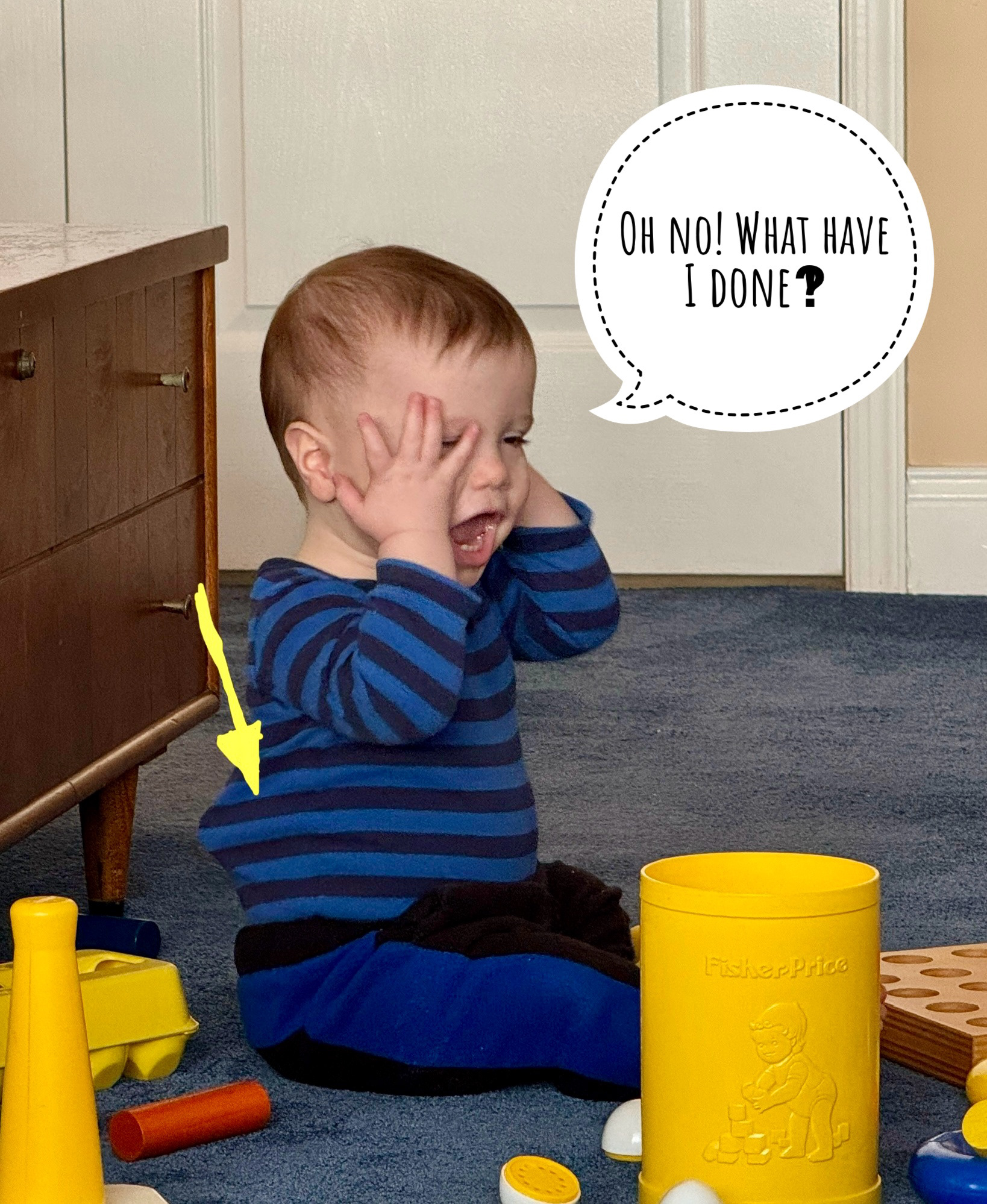 The background here is that J was playing with the old wooden pegs and dropped one down the back of his shirt!