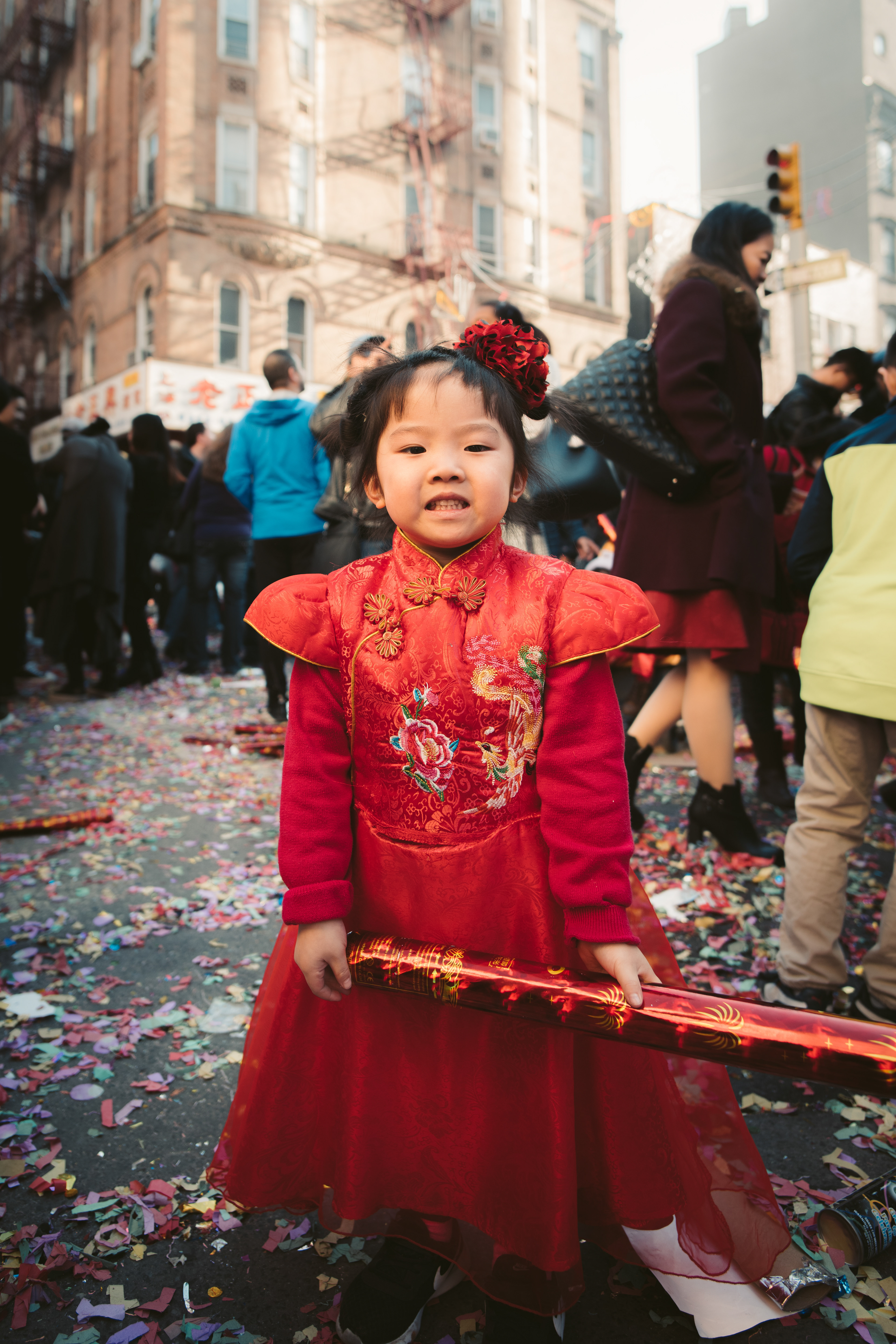 A little girl in traditional Chinese attire on Chinese New Year in New York City